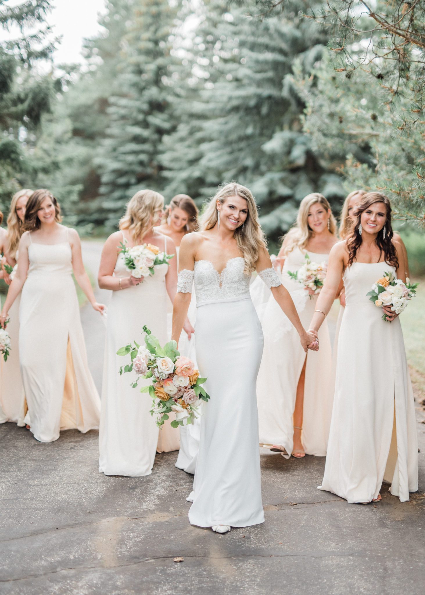 Bridesmaids in cream and ivory custom made bridesmaid gowns