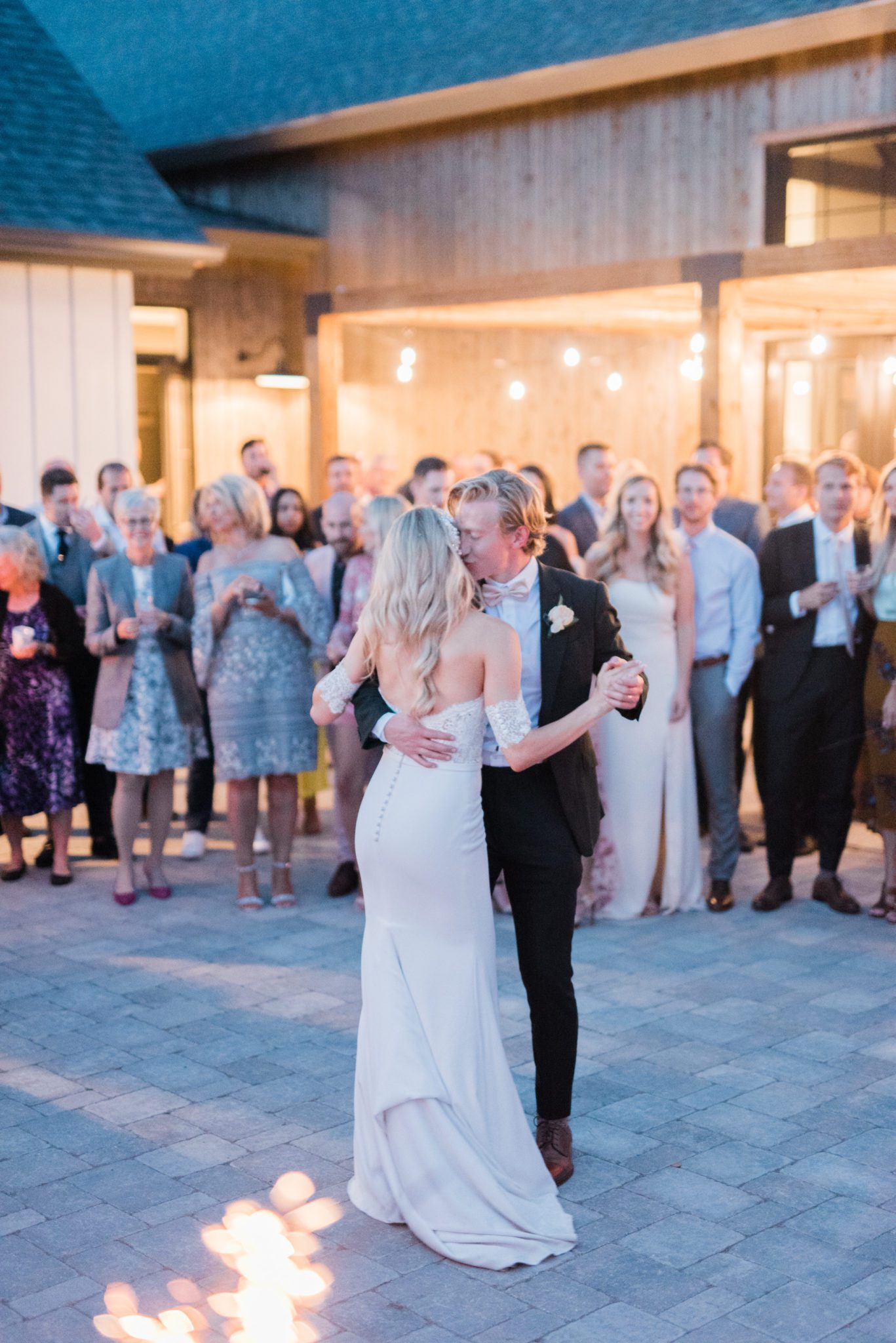 First dance with sparklers at an outdoor barn venue