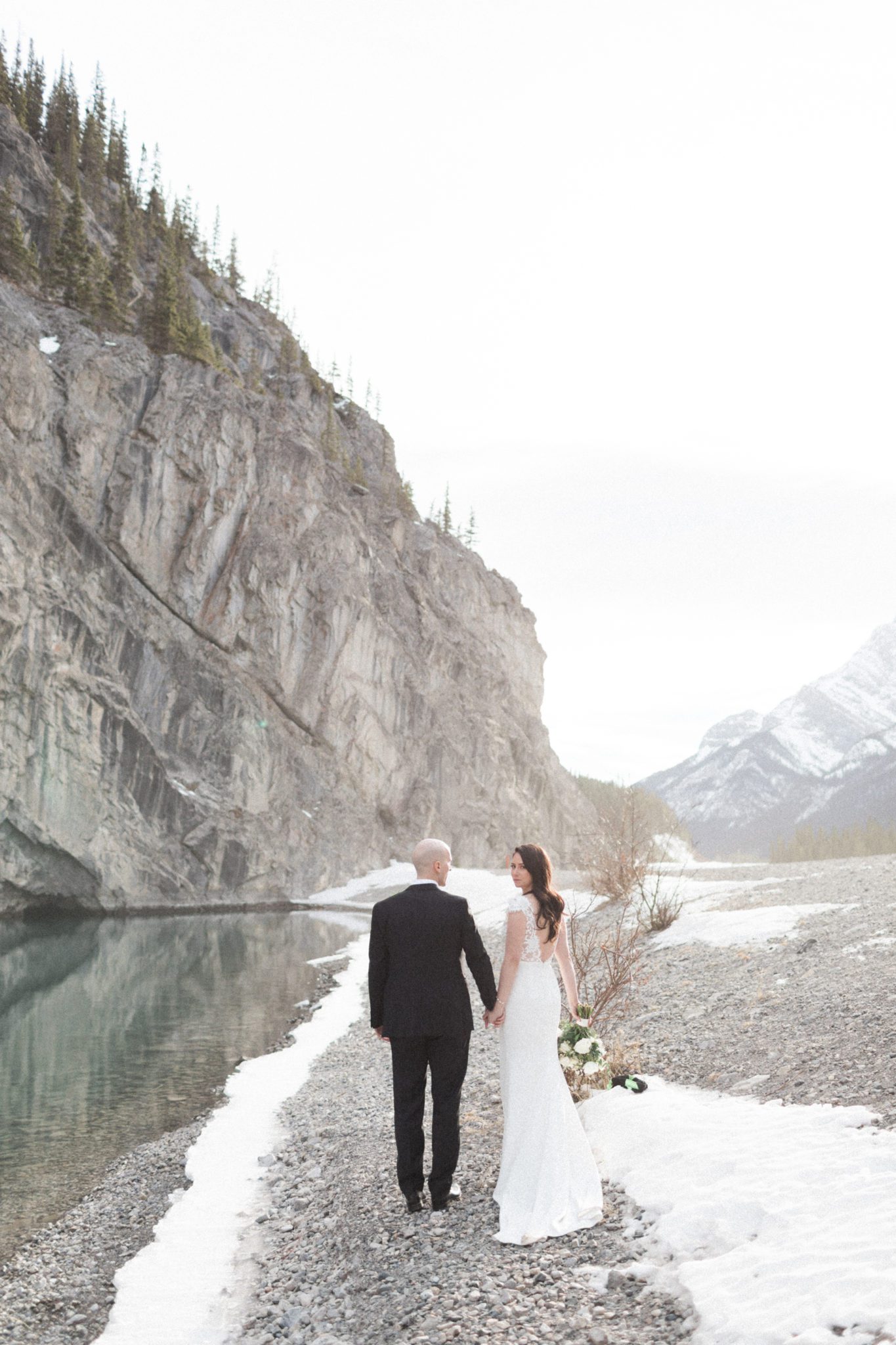 This Monochromatic Calgary Minimony Ends With Sunset Portraits in the Mountains Featured by Brontë Bride