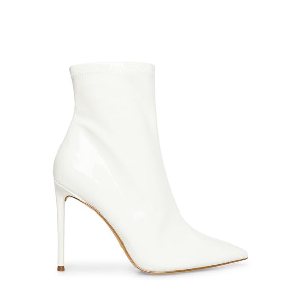 Stunning white wedding boots for a winter wedding