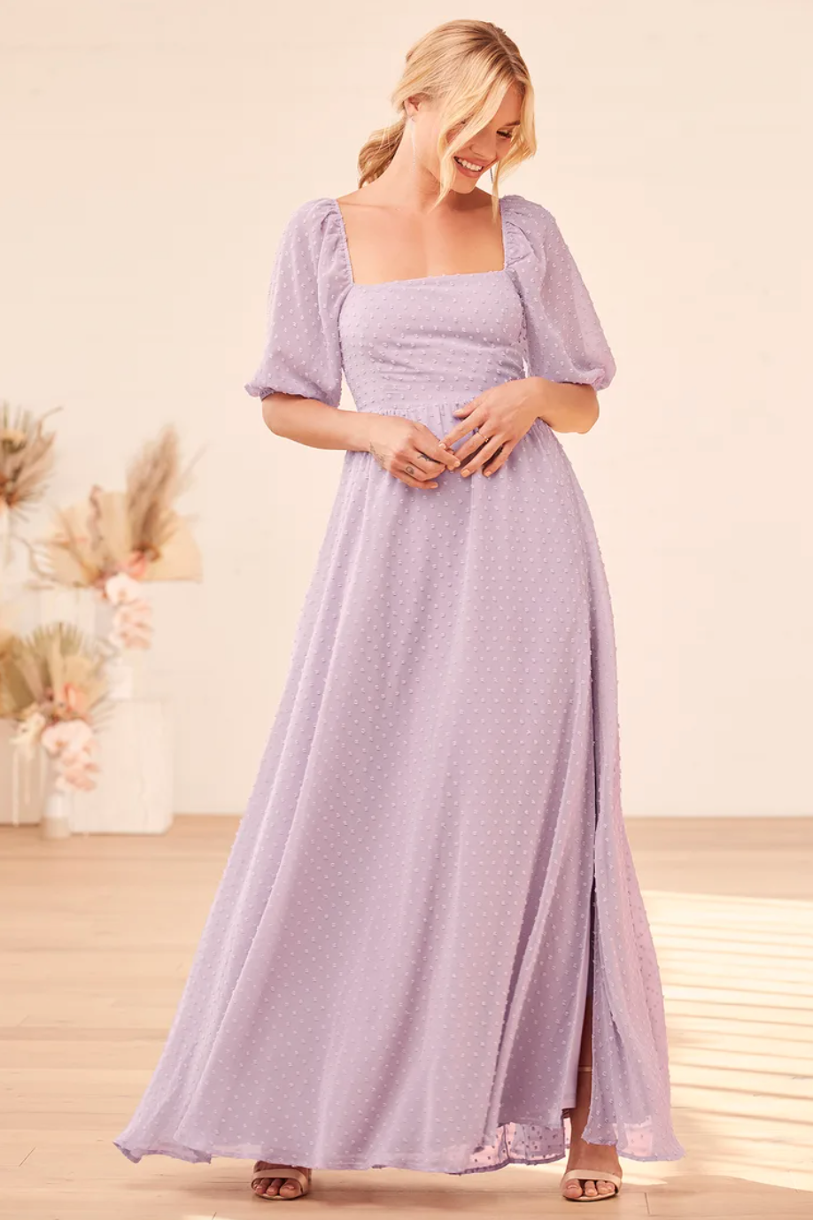 Lavender bridesmaid gown with sleeves perfect for a spring wedding