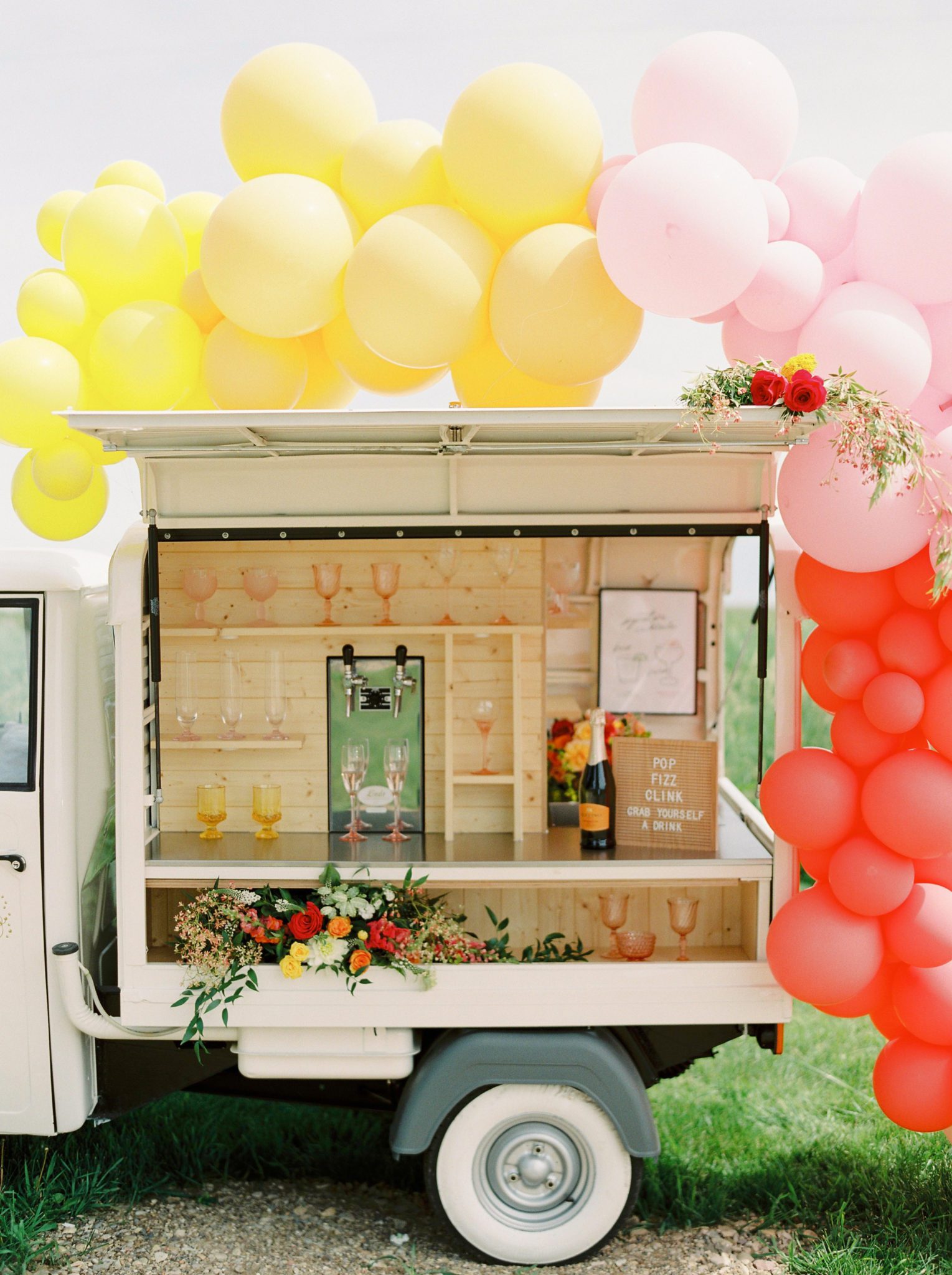 Mobile Prosecco Cart with Rainbow Balloons