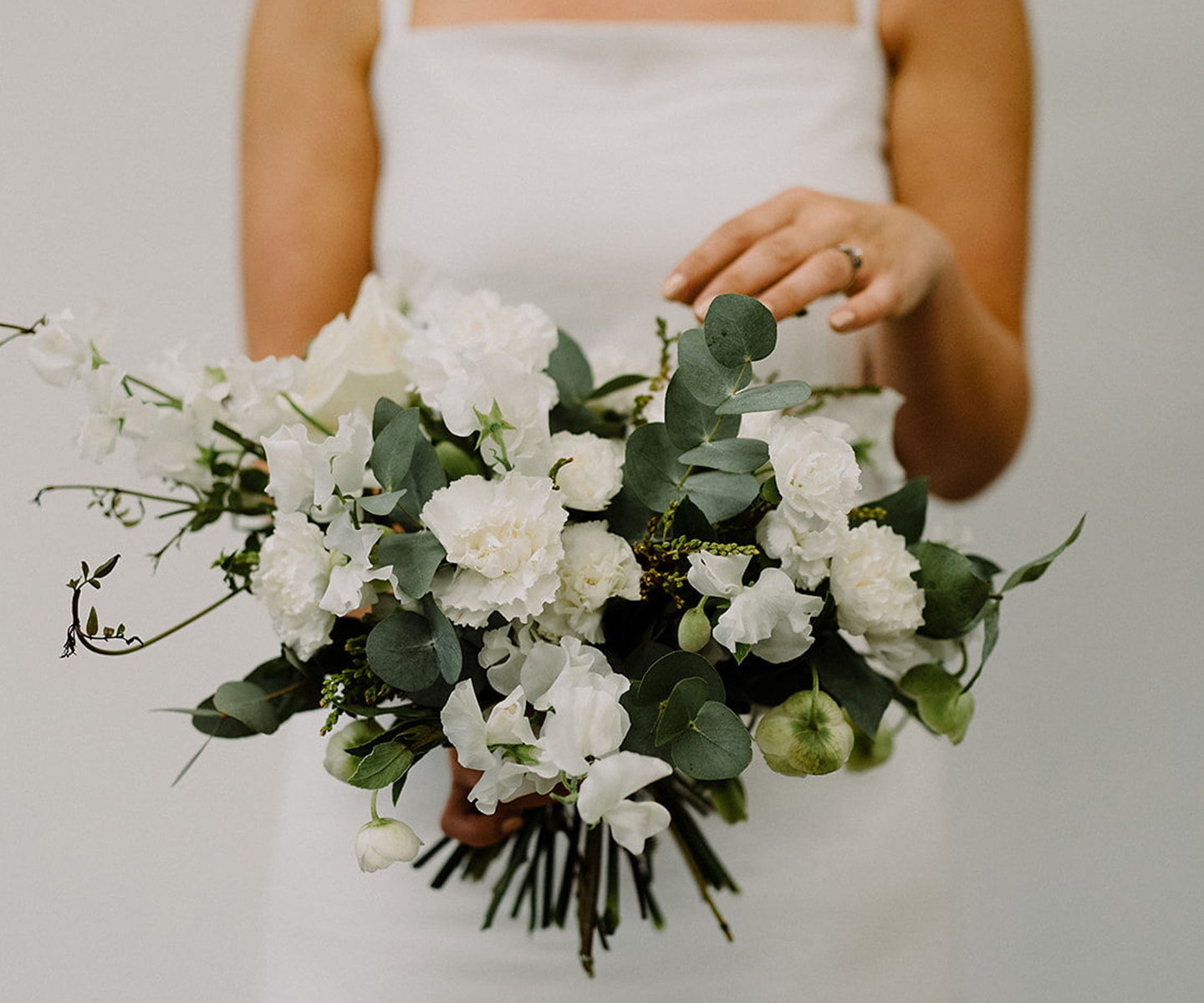 White wedding bouquet with carnations