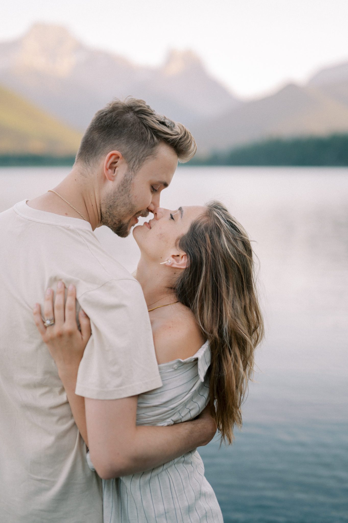 Couples session in the mountains with lakeside views