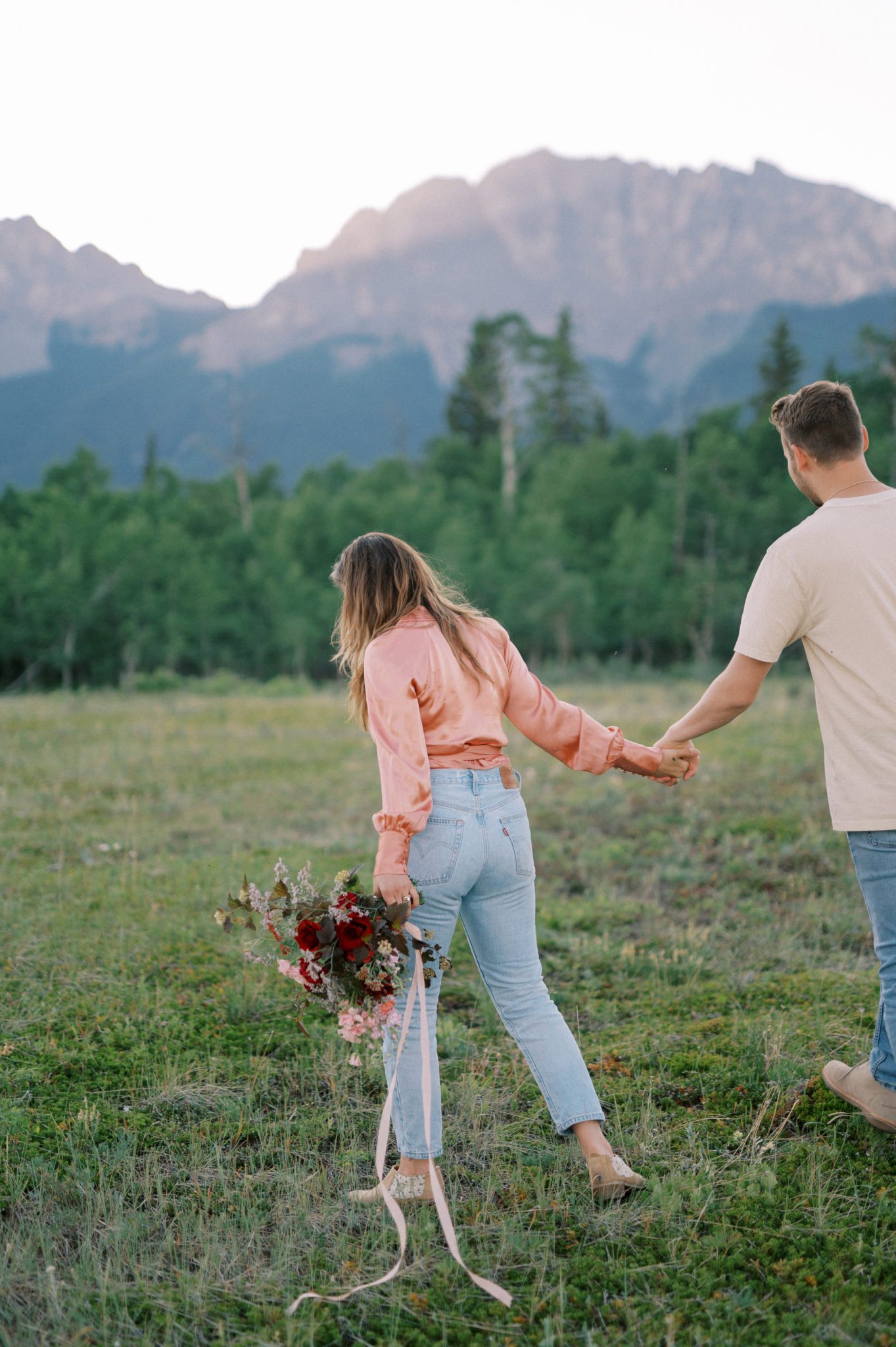 Free spirited couples session in a mountain meadow