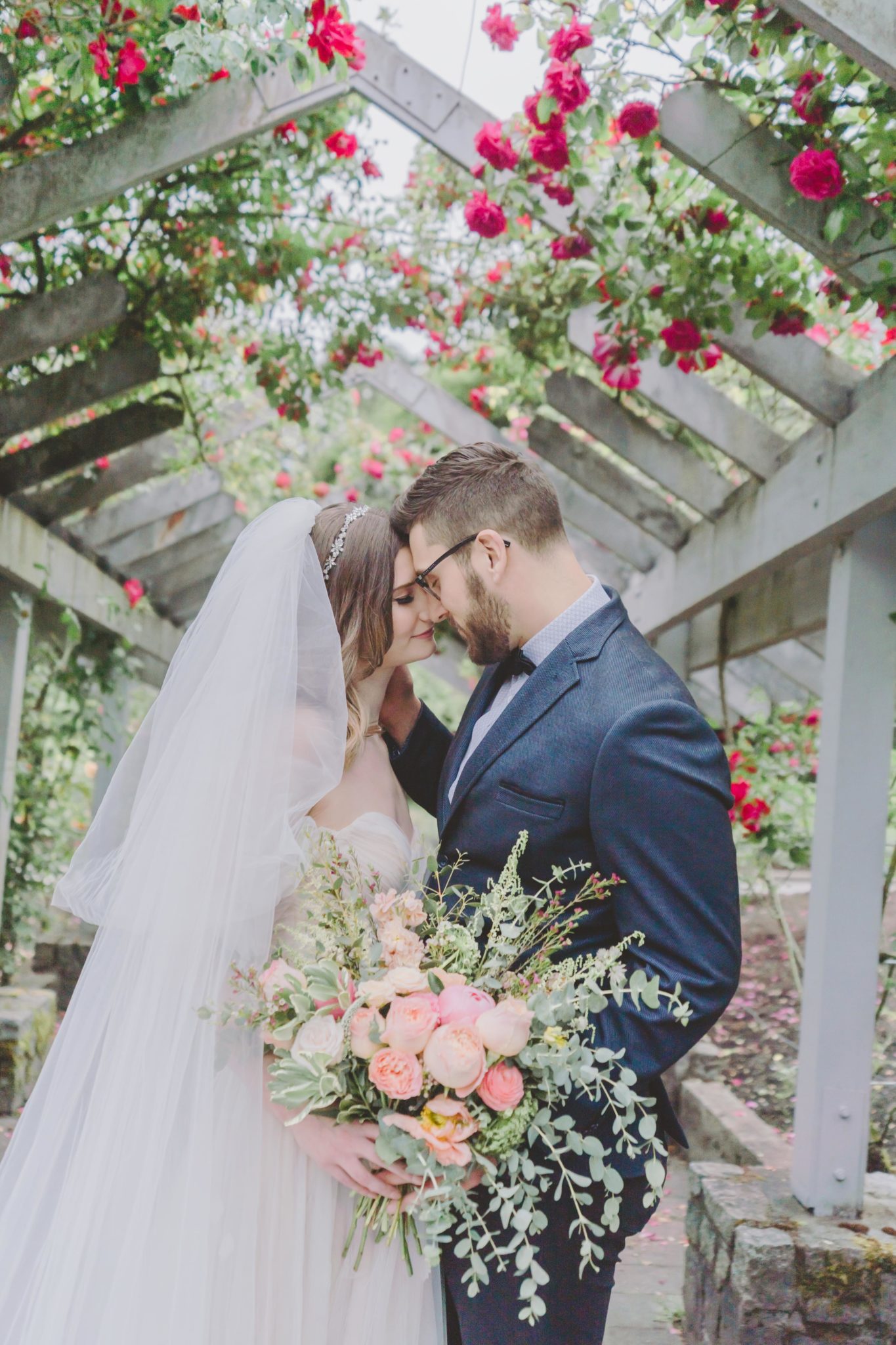 Romantic rose garden wedding inspiration with cathedral veil