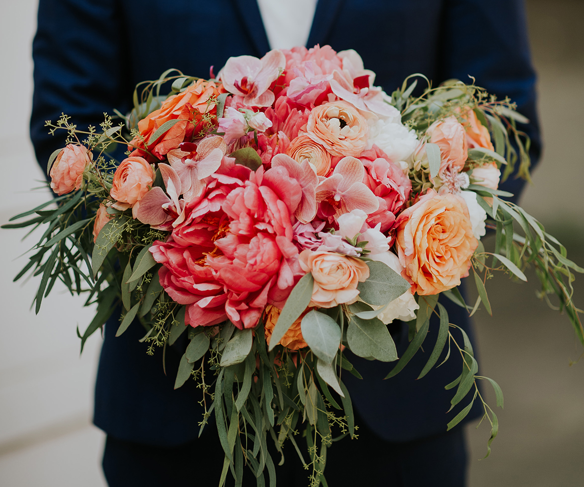 Wedding bouquet inspiration with peach, pink and coral hues