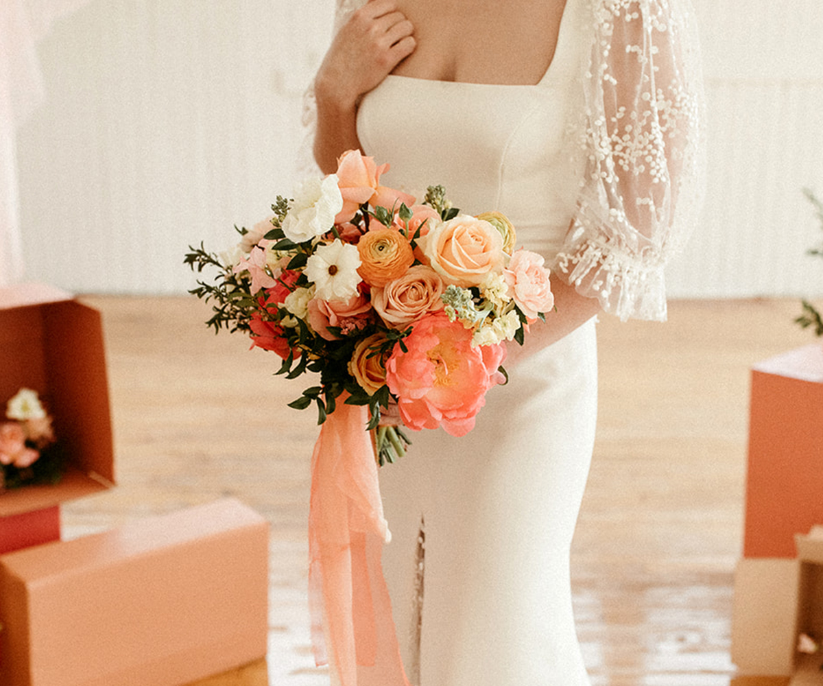 Bridal bouquet inspiration with coral, peach and tangerine blooms