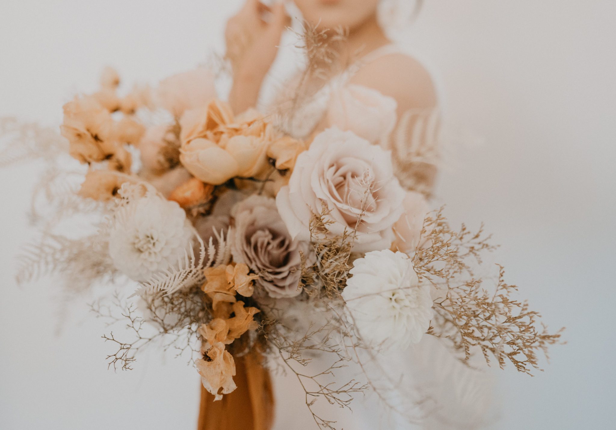 Ochre, toffee and white floral inspiration in dried floral bouquet