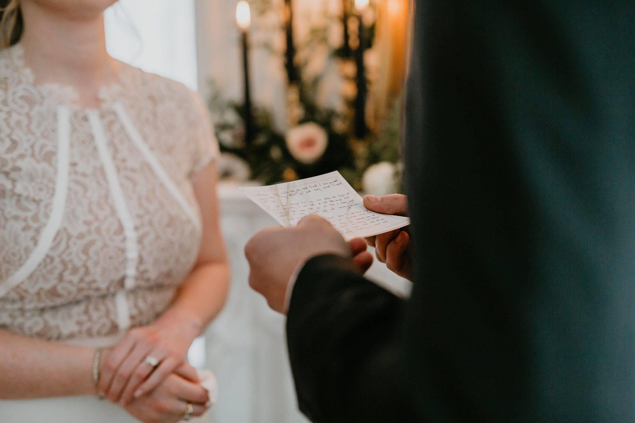 Vows read at intimate living room wedding ceremony
