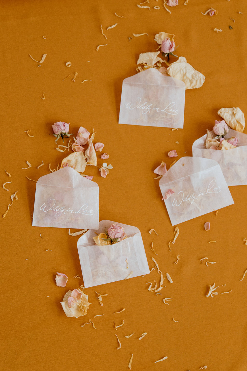 Dried rose petal pouches for wedding day details