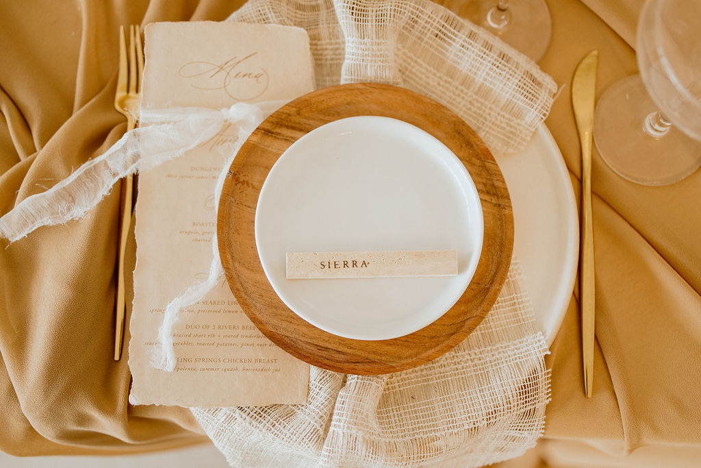 Creative clay place cards for a fall wedding with boho styling
