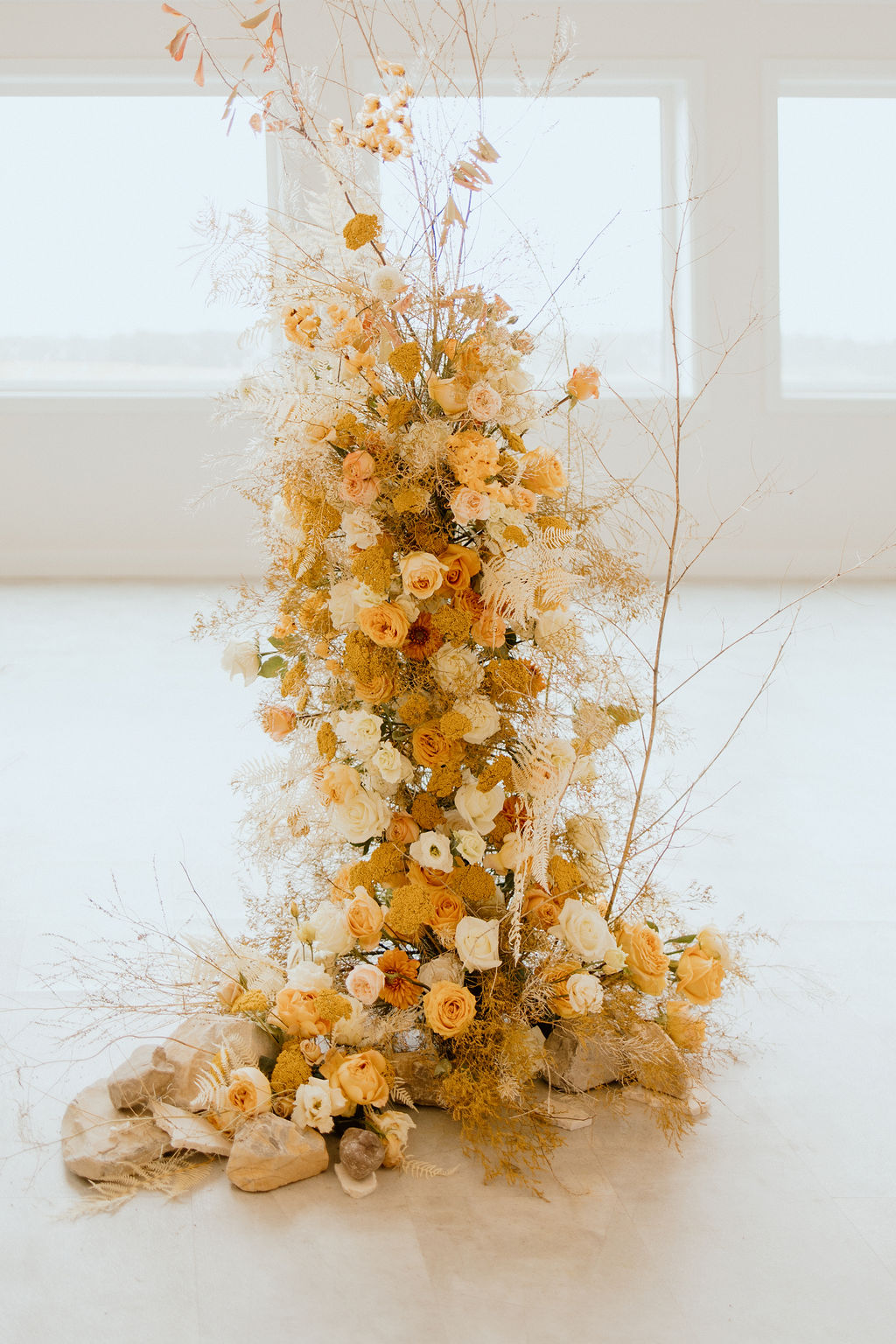 Fall wedding colour palette grounded floral arch for ceremony decor