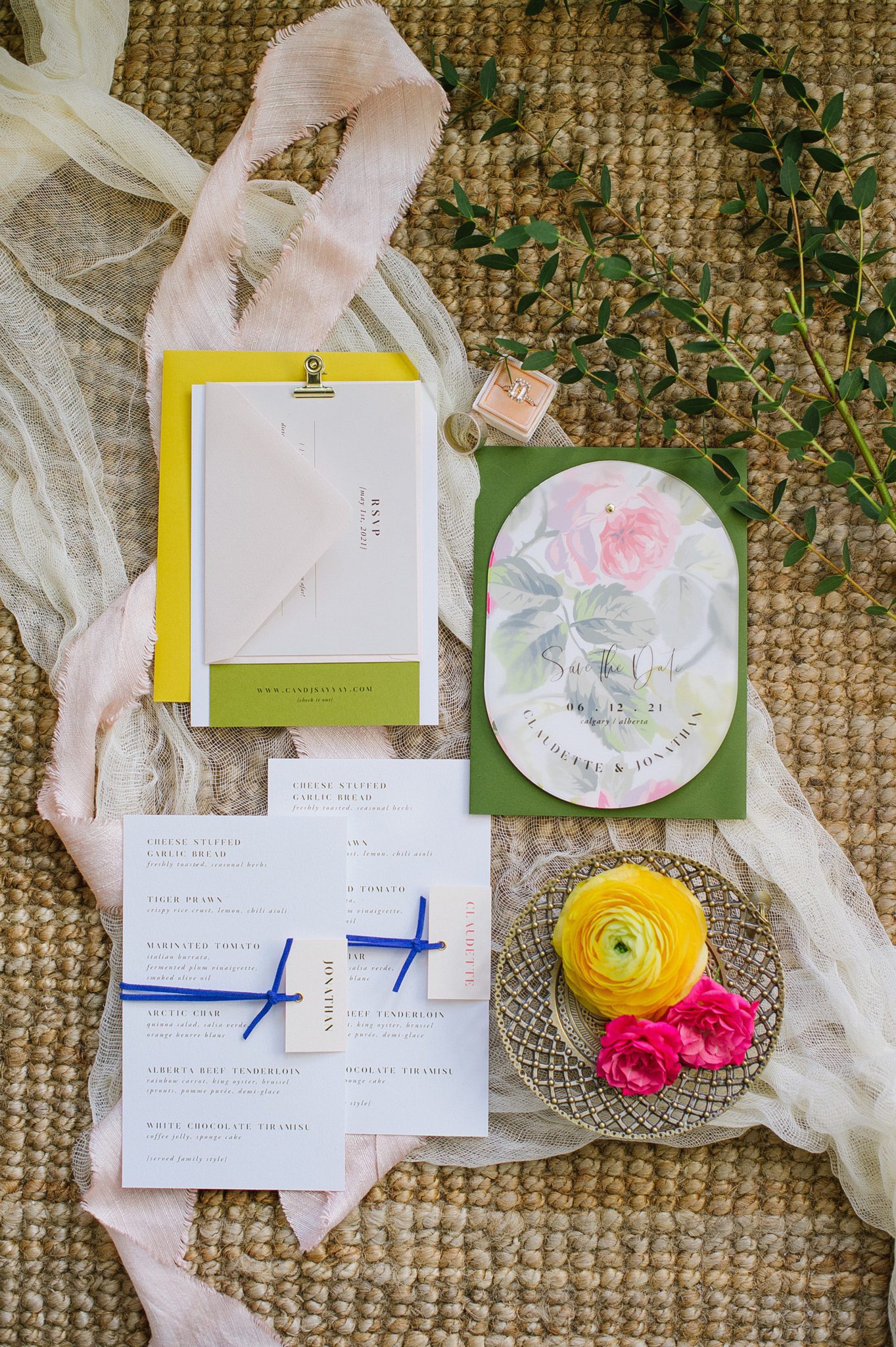 Bright pink and yellow wedding colours and stationary for a spring wedding