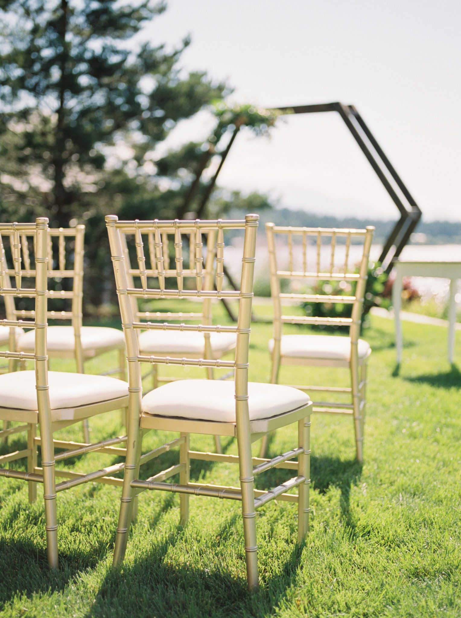 Golden chairs for a romantic Invermere wedding ceremony