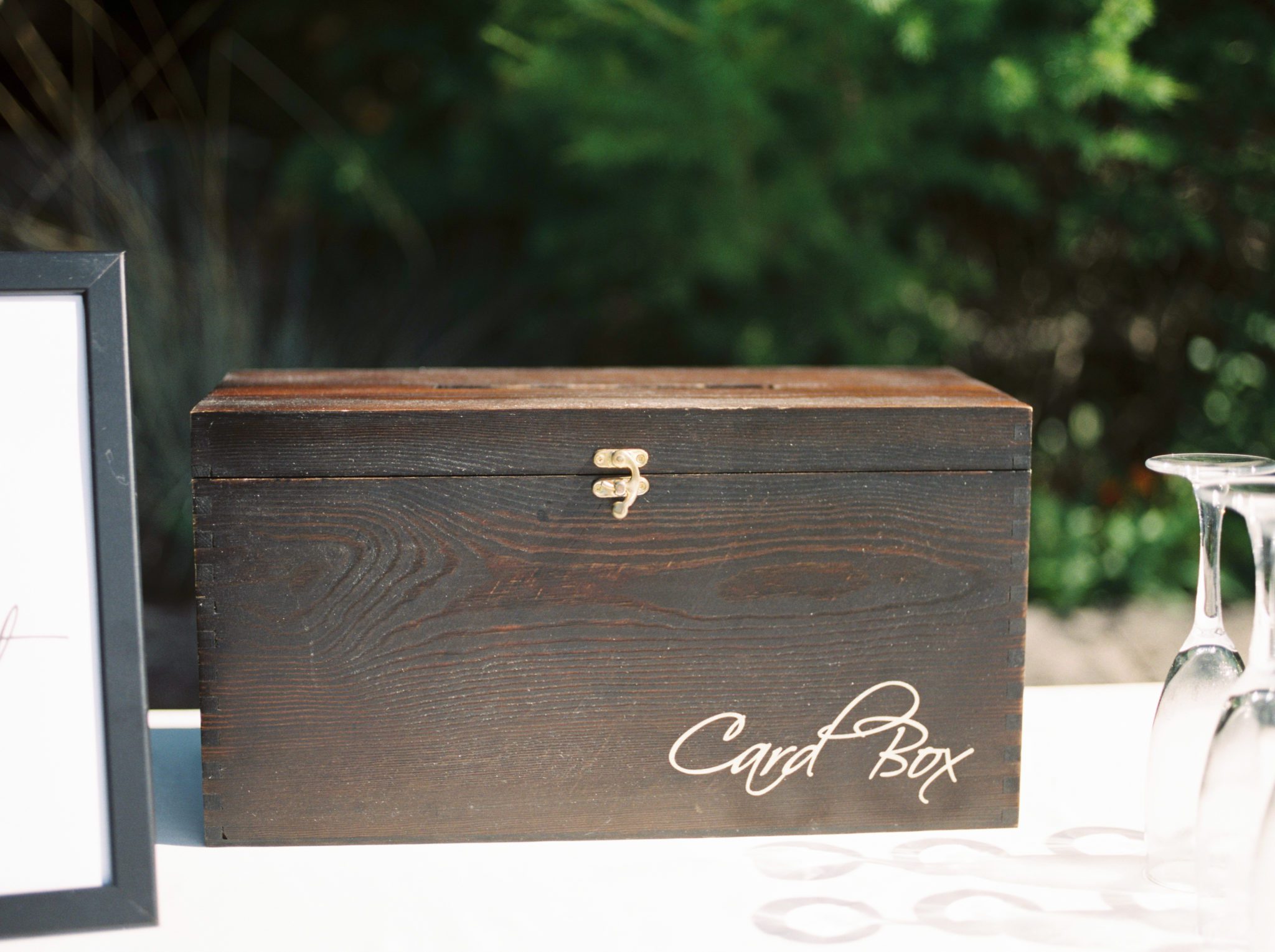 Wooden brown wedding card box at an Invermere Wedding ceremony