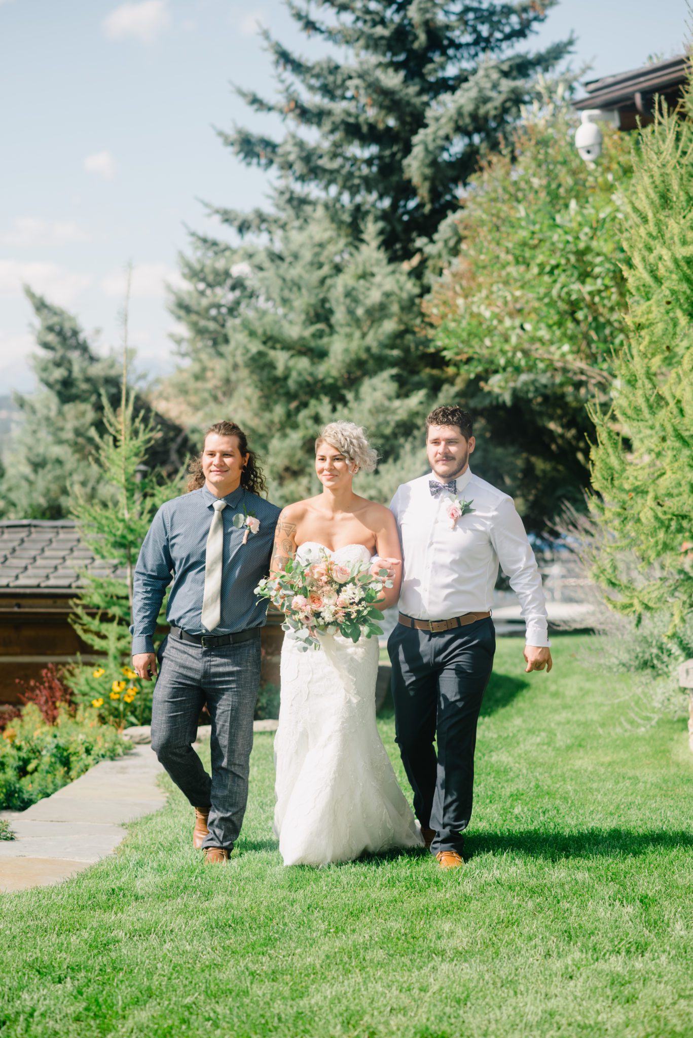 Bride walks down the aisle at this Invermere wedding ceremony