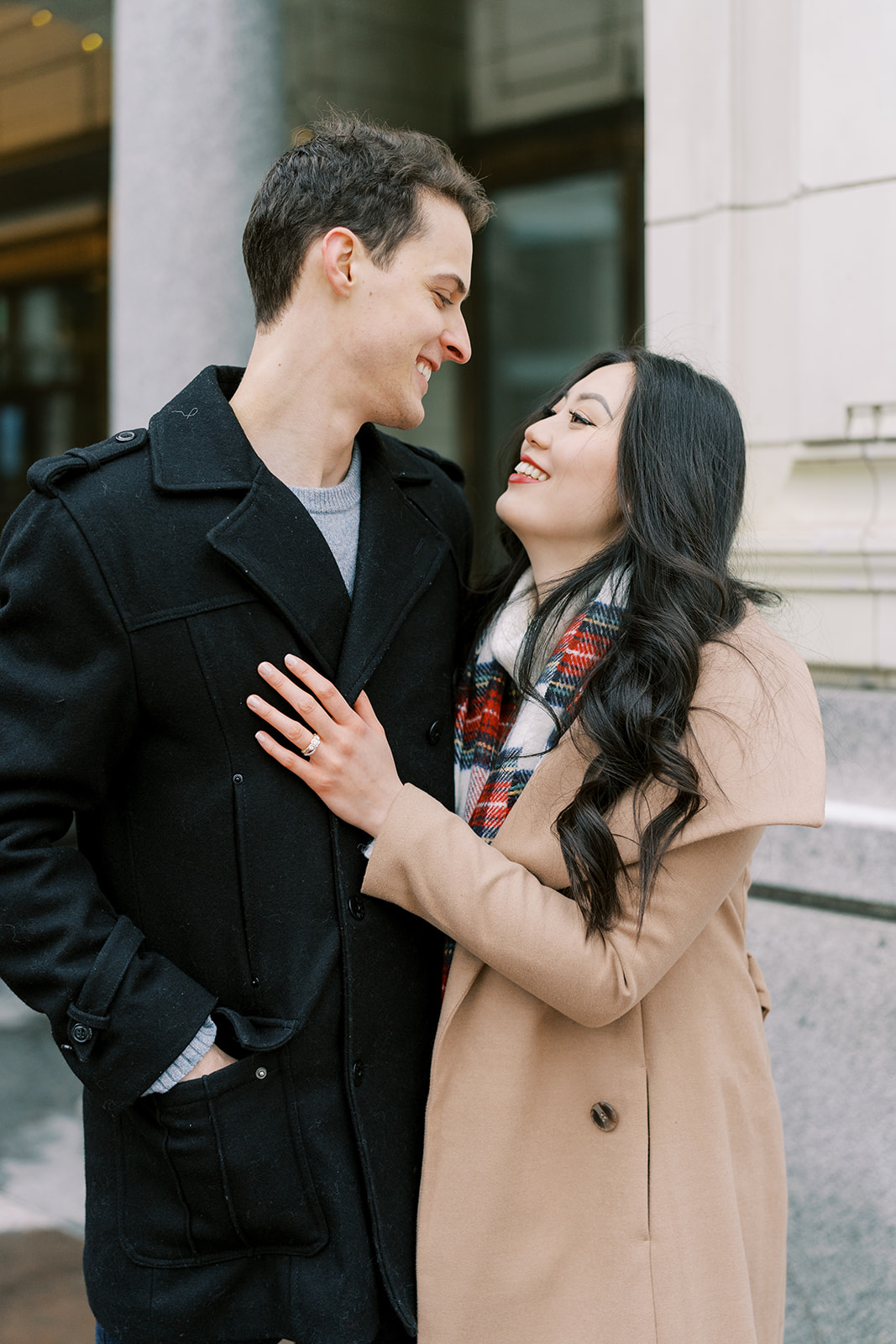 Cute couple posing ideas for downtown engagement session