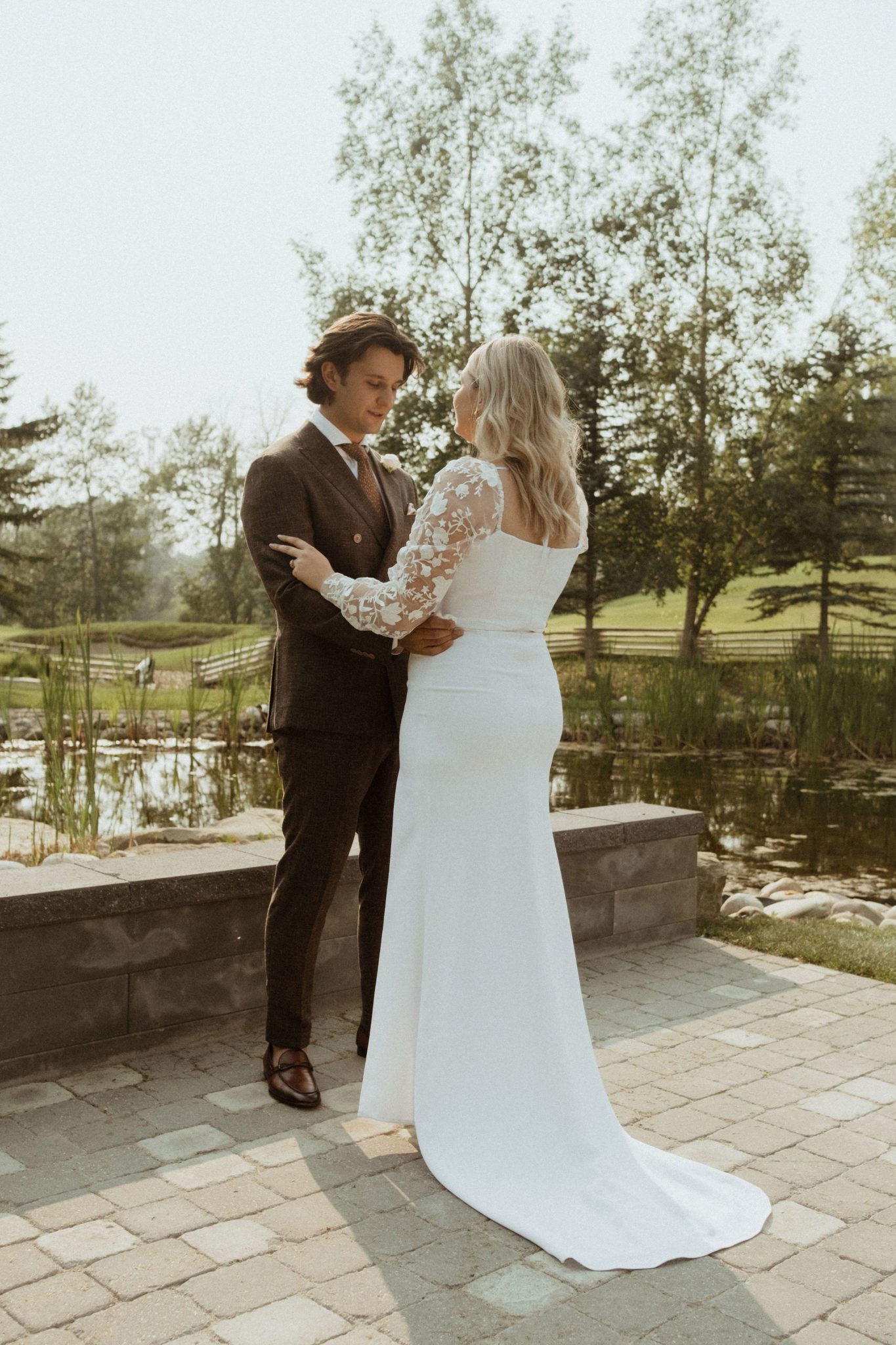 Bride and groom share first look at this outdoor summer surprise wedding in Calgary, groom attire inspiration, cottage core wedding attire inspiration 