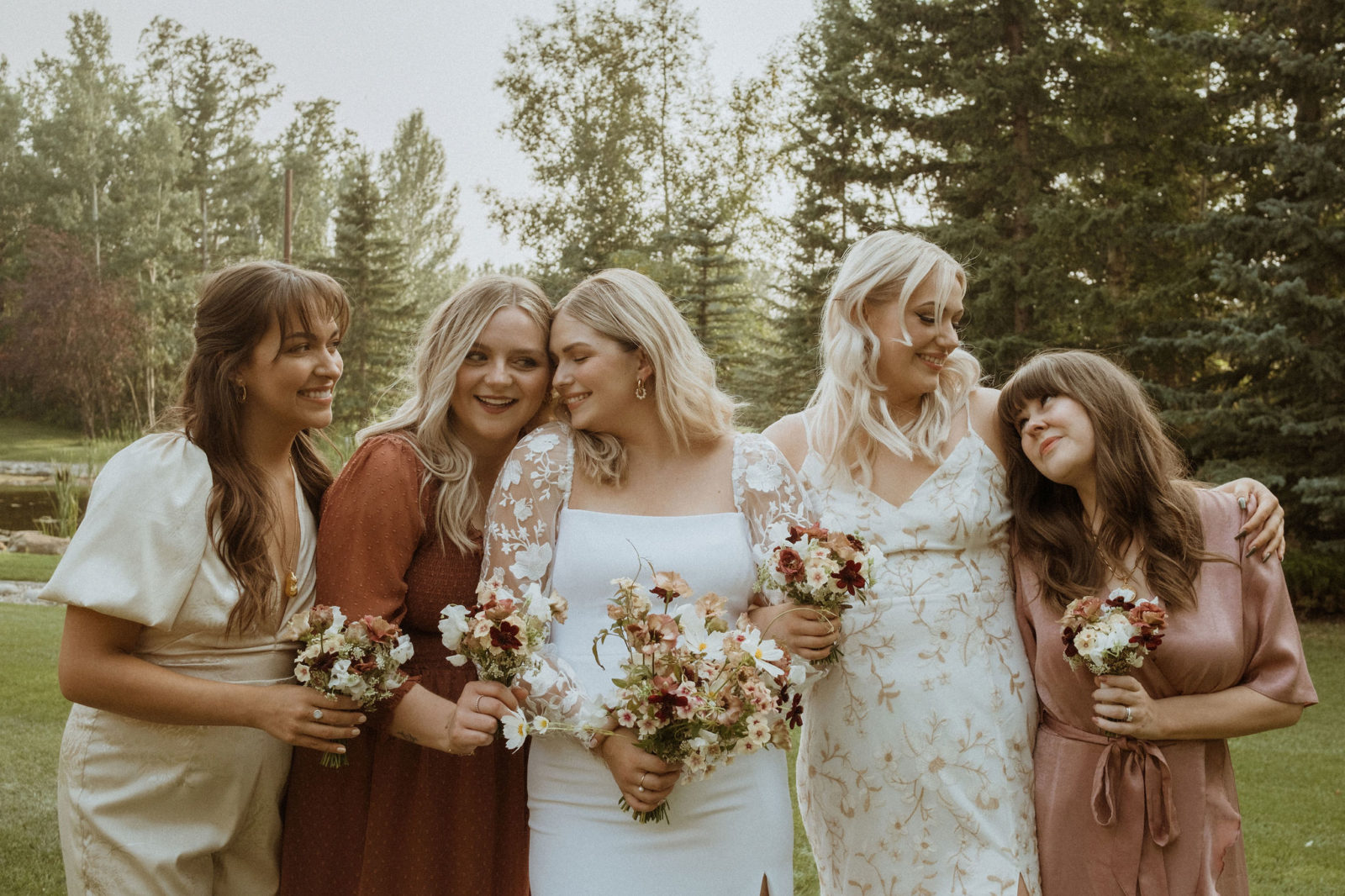 Unique bridal party outfits, bridal party attire inspiration, cottage core wedding wear in peach and dusty pink