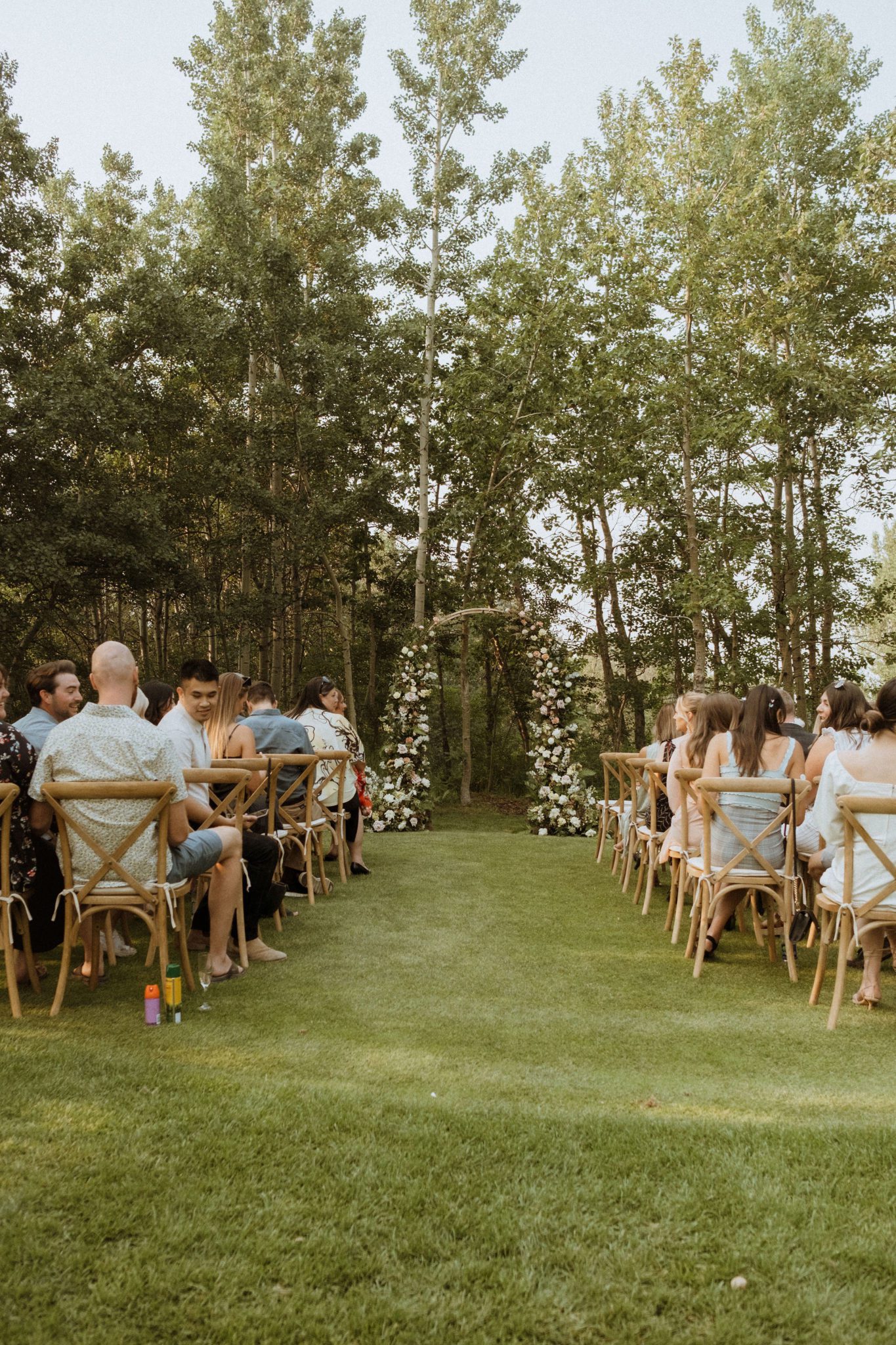 Dramatic floral arch is the centerpiece for this outdoor summer wedding, summer wedding decor inspiration