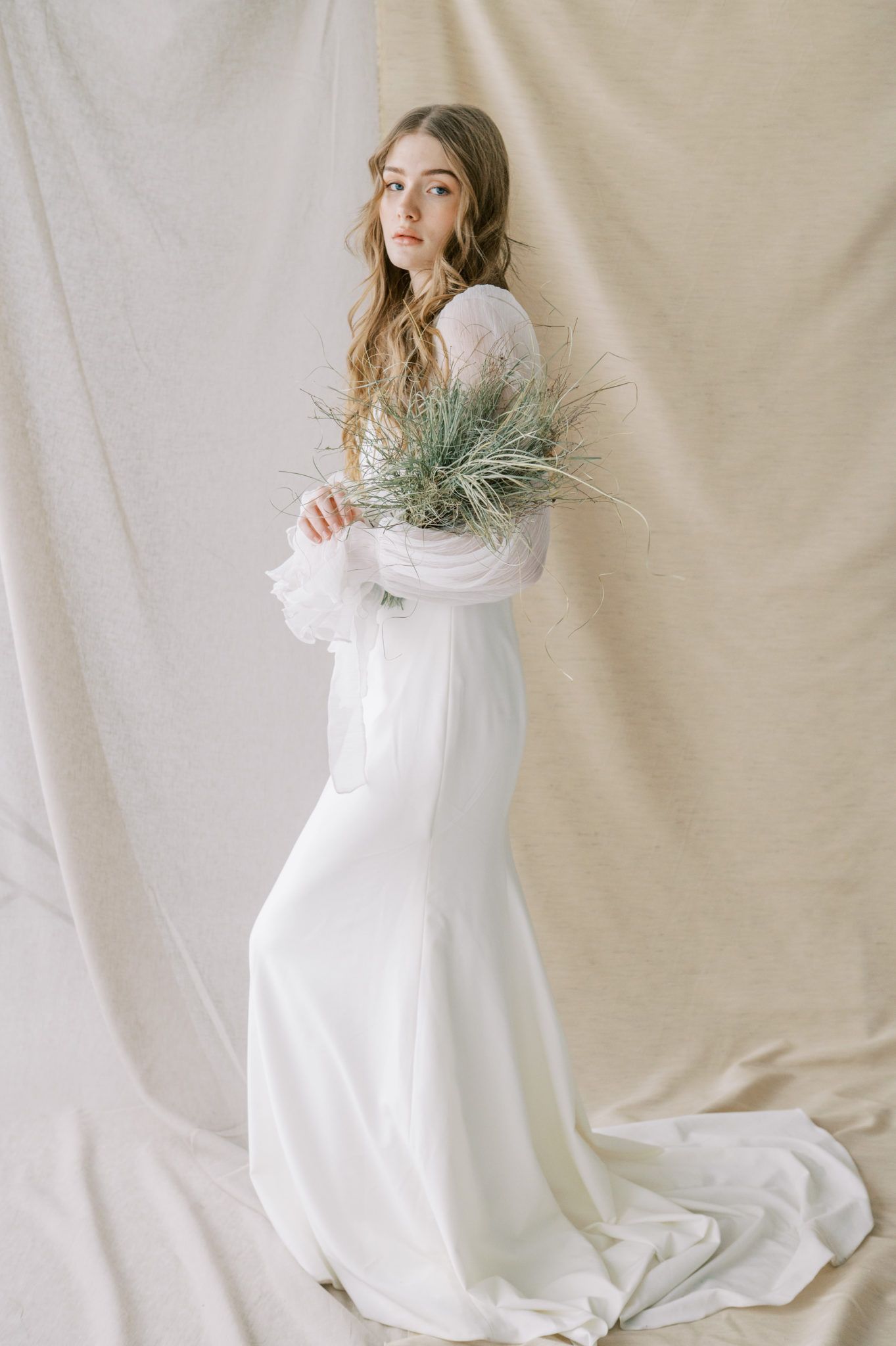 Neutral earth-tone backdrop for bridal studio-session, unique bouquet inspiration using dried grasses for the bohemian bride