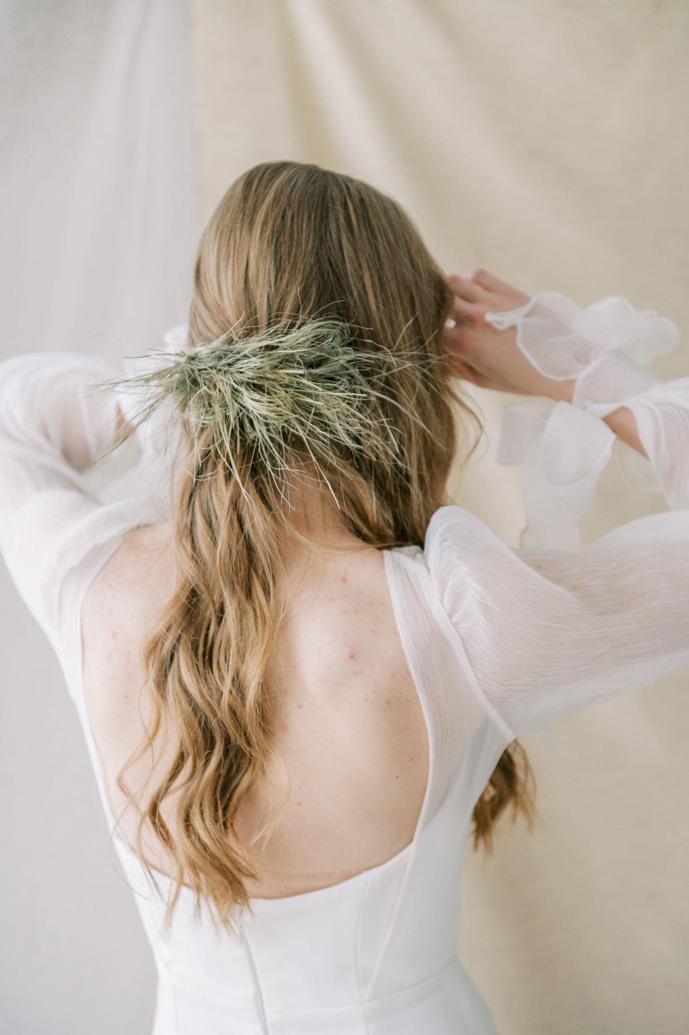 Alternative bridal hair inspiration using dried grasses