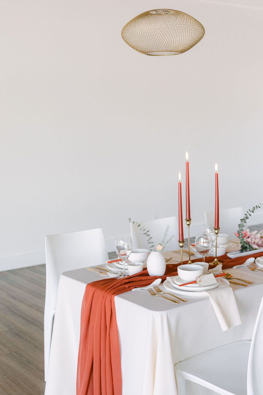 White and Red Modern Tablescape with Asian inspired decor and bold modern accents.