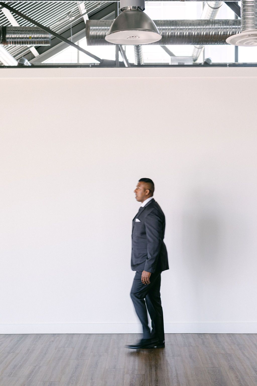 Charcoal Grey suit and tie for groom's fashion inspiration in this Vancouver Wedding Inspiration.