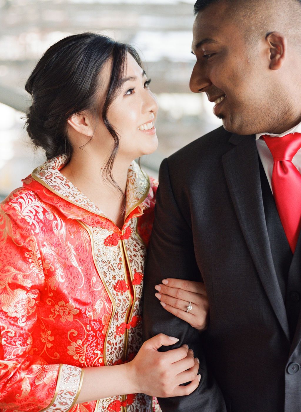  Multicultural wedding inspiration in Vancouver, bride and groom attire with bright red accents
