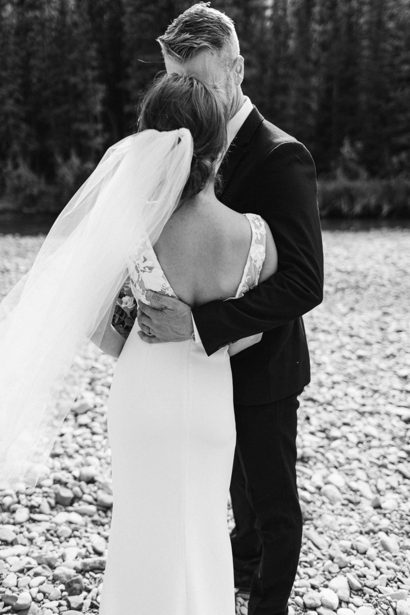 Chic crepe wedding gown from Park & Fifth in Canmore Wedding.