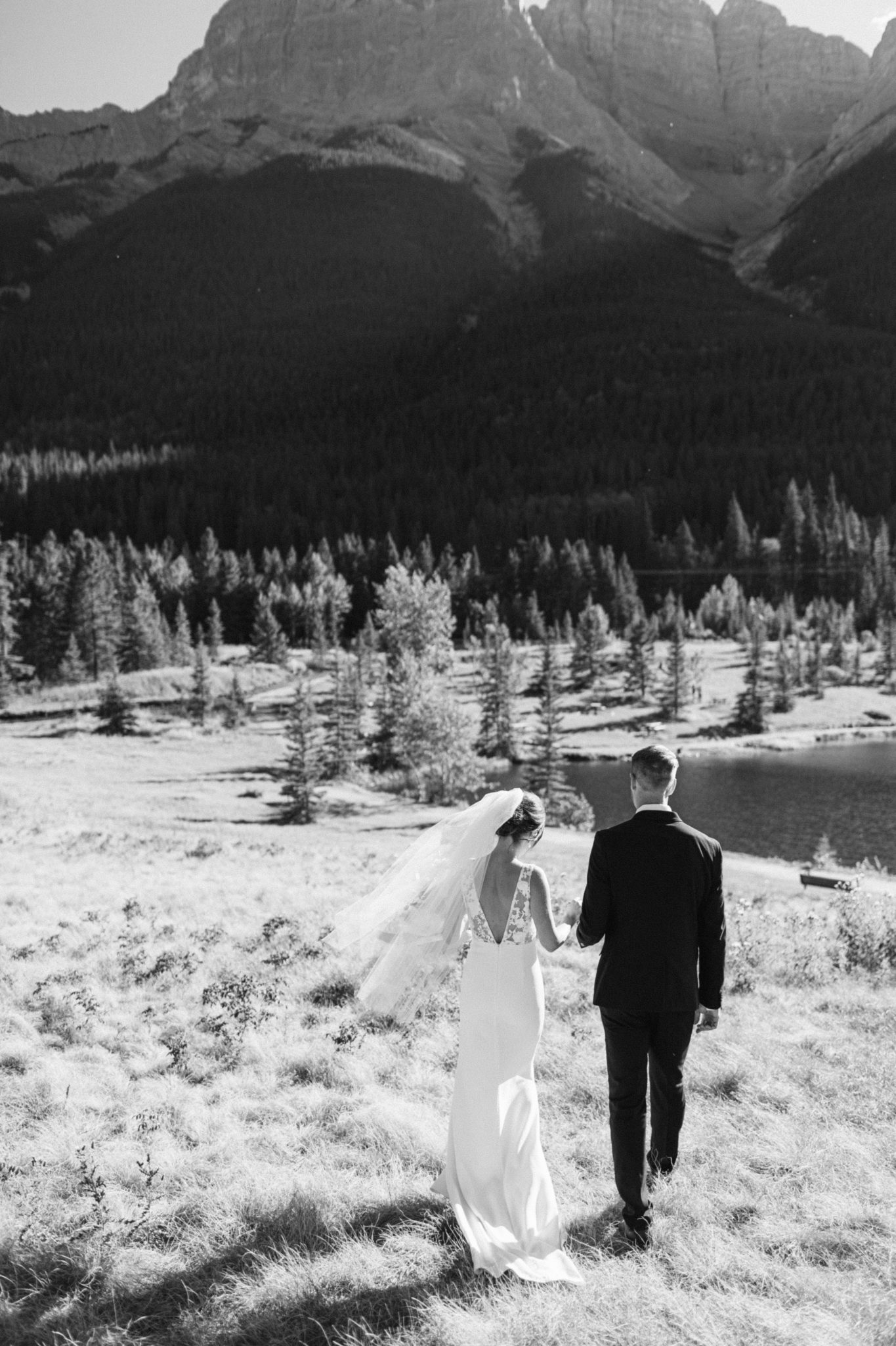 Intimate, outdoor September wedding in Canmore Alberta. Bride and Groom Portraits in the Mountains.