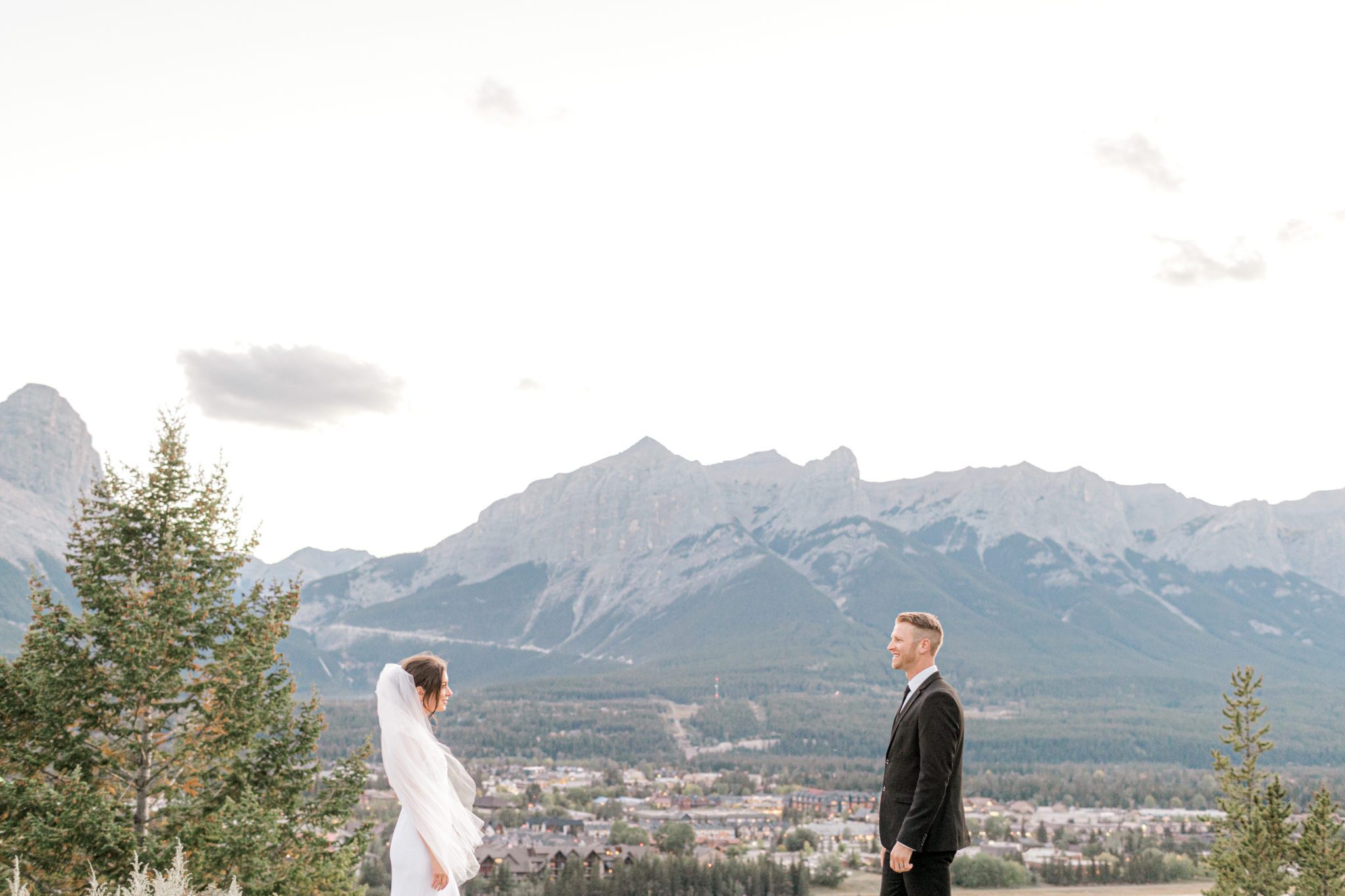 Couple has classic styled intimate wedding in Canmore, Alberta. 