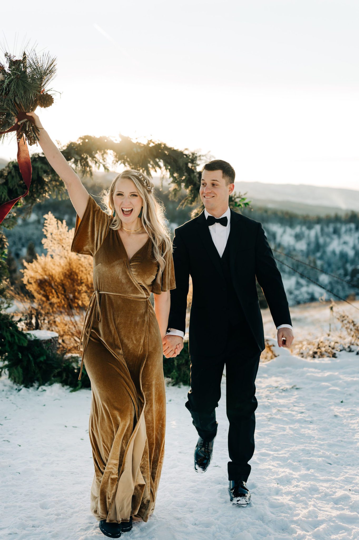 Finally Mr and Mrs at the outdoor winter elopement in BC, Pine green and forest wedding bouquet inspiration, amber velvet dress