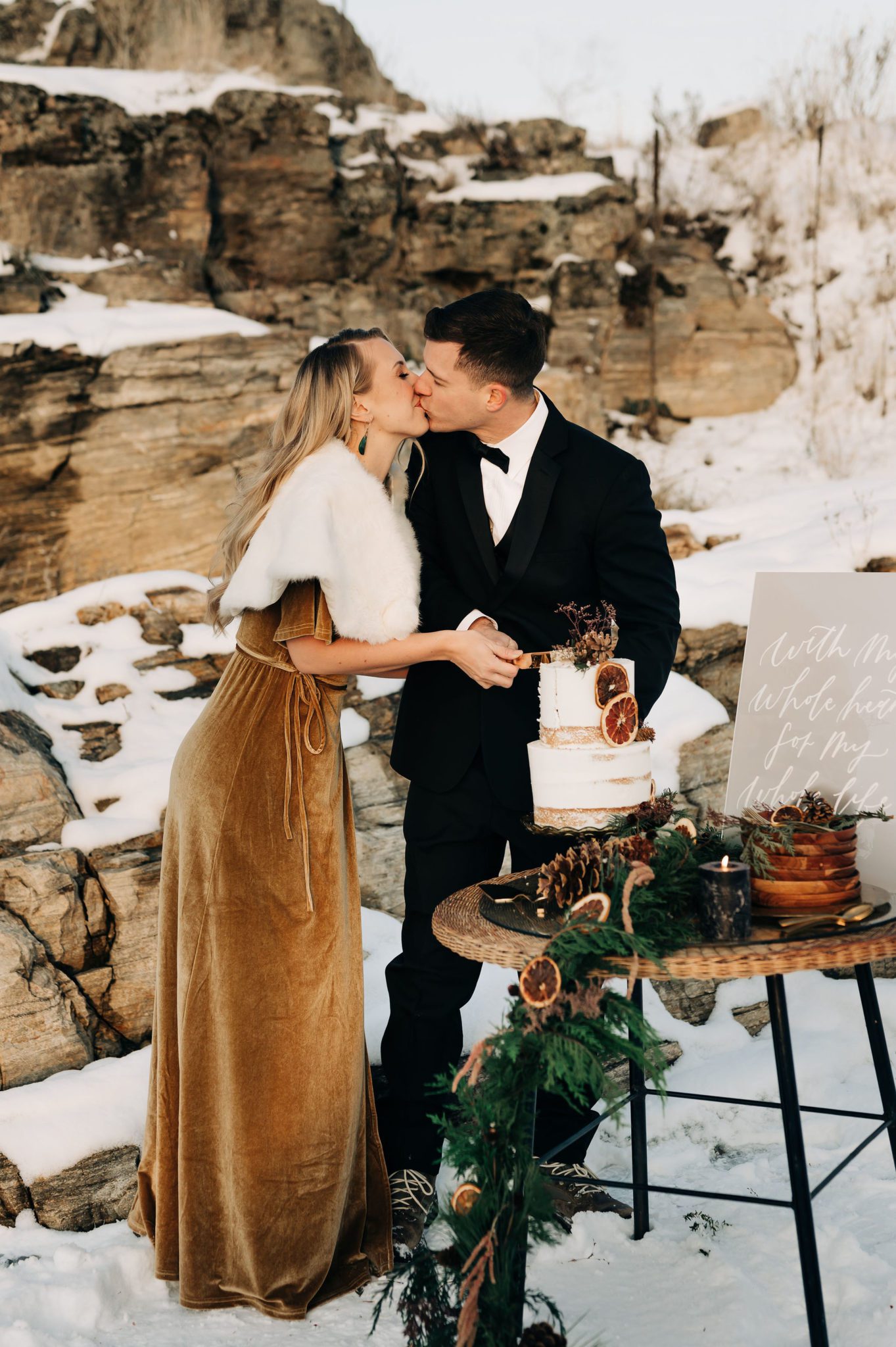 Outdoor winter elopement cake cutting, naked cake wedding inspiration