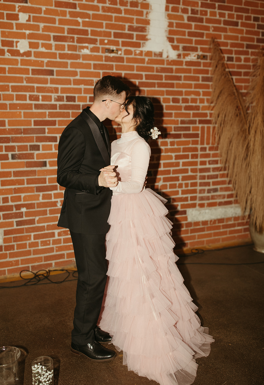 Couple has first dance at this vintage inspired boho wedding, ruffled bridal gown