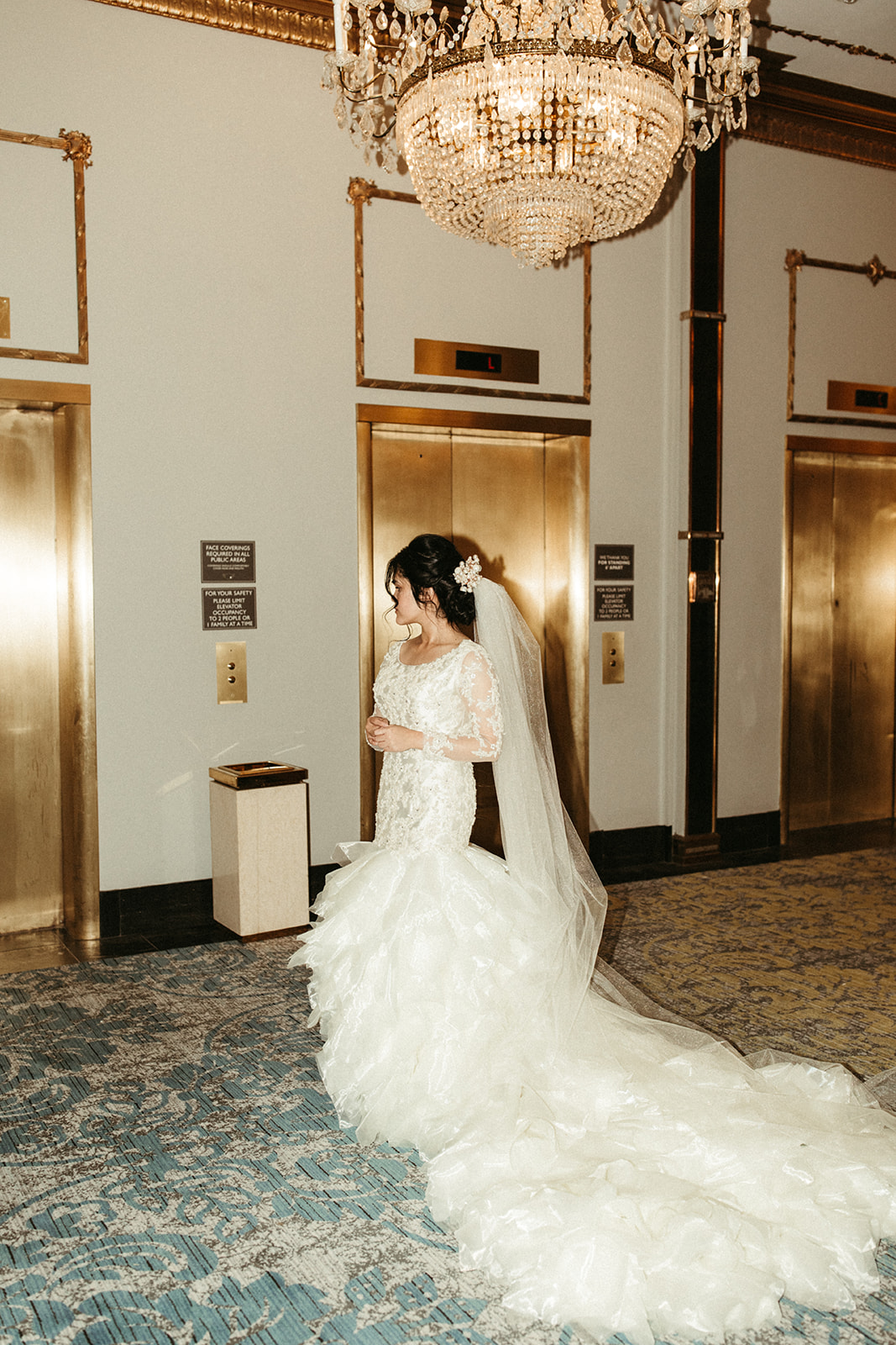 Unique bridal portraits in hotel, ruffled bridal gown inpsiration