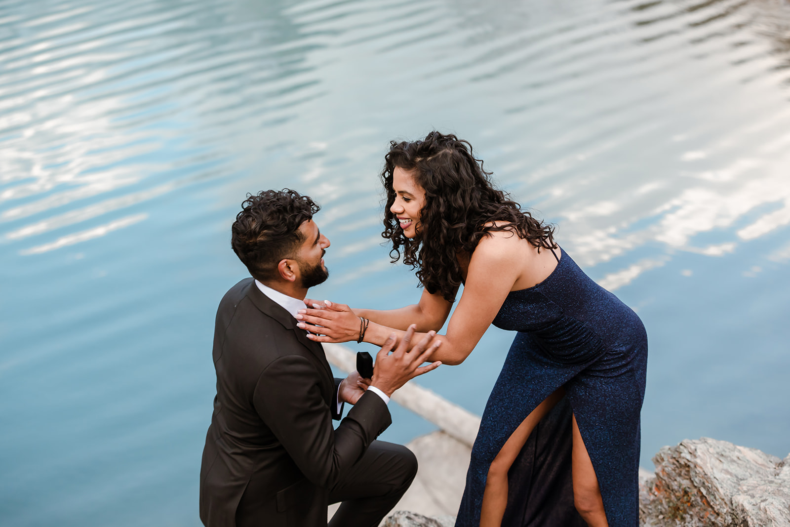 Mountain surprise proposal, outdoor proposal photography, engagement outfit inspiration, blue satin engagement gown