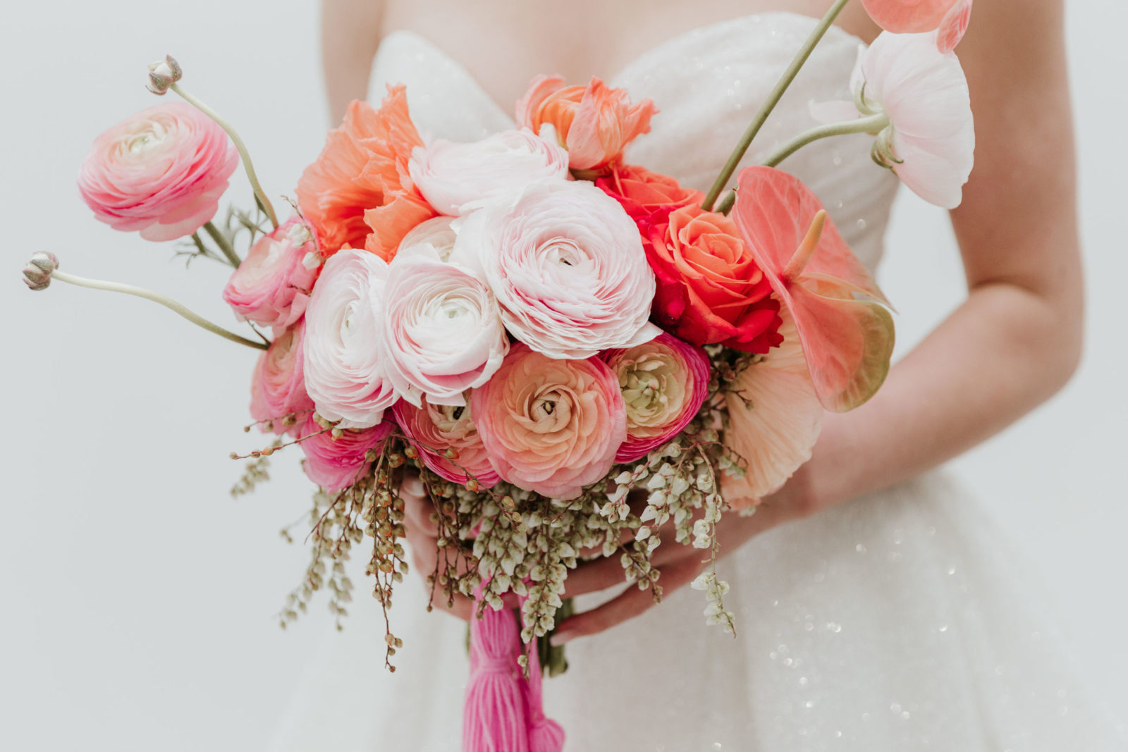 Modern and Glamorous Wedding Celebration Inspiration With A Pop of Pink | bold orange and pink bridal bouquet for the modern bride