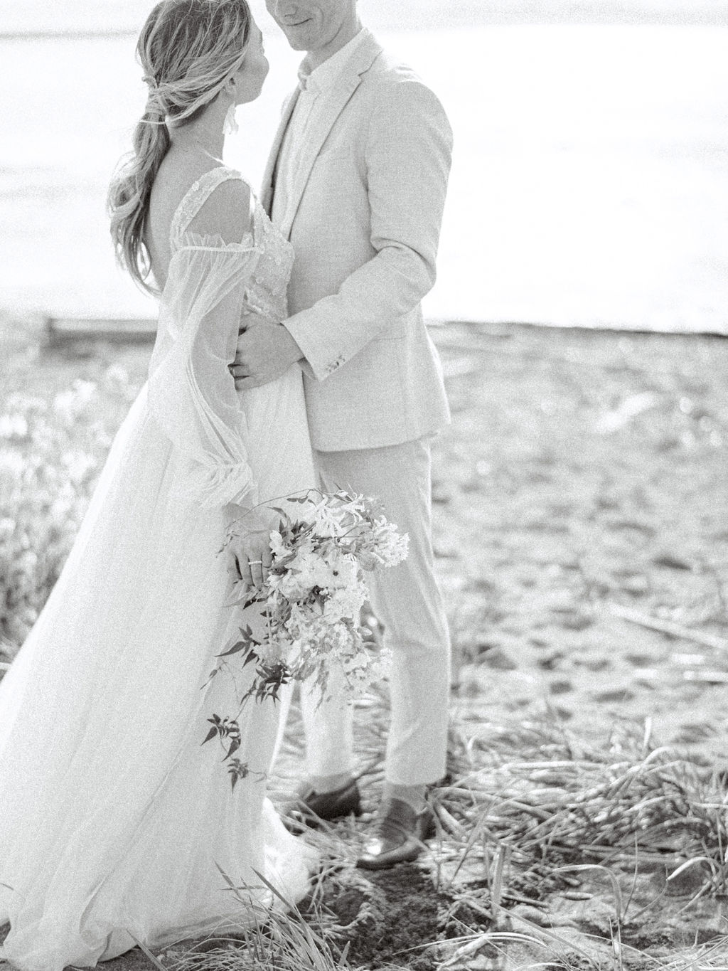 Black and white wedding portraits on the beach in Vancouver, British Columbia; Fine art wedding inspiration for an intimate beach wedding, light and airy wedding portraits