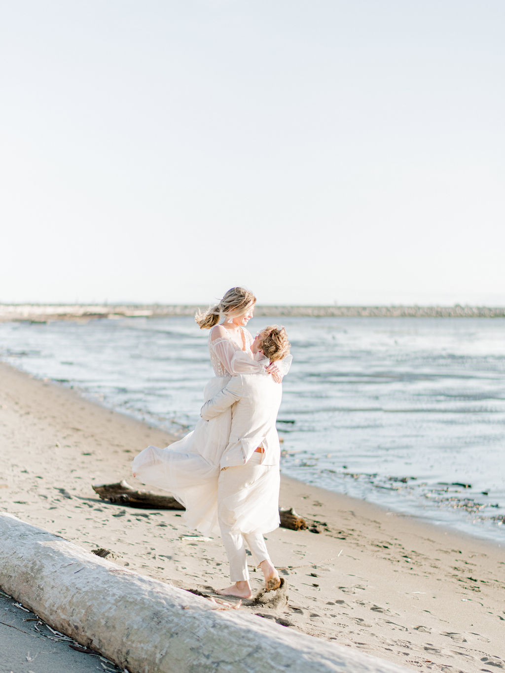 Romantic wedding portraits on the beach in Vancouver, British Columbia; Fine art wedding inspiration for an intimate beach wedding, light and airy wedding portraits