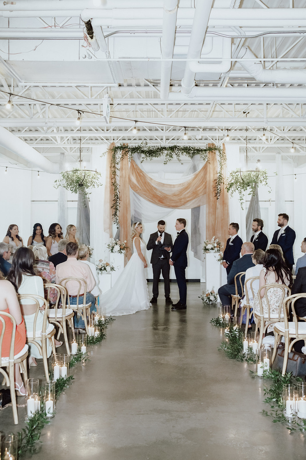 indoor garden wedding, gardenesque florals, hanging fabric installation for reception