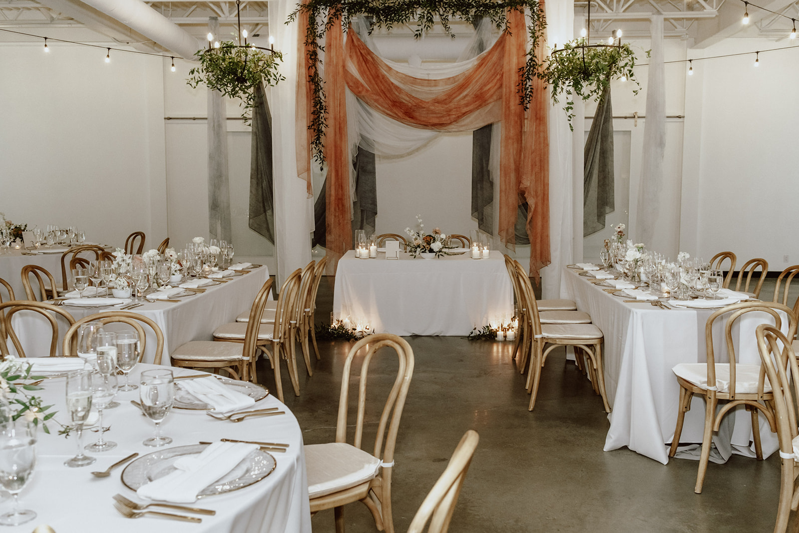 indoor garden wedding, gardenesque florals, hanging fabric installation for reception
