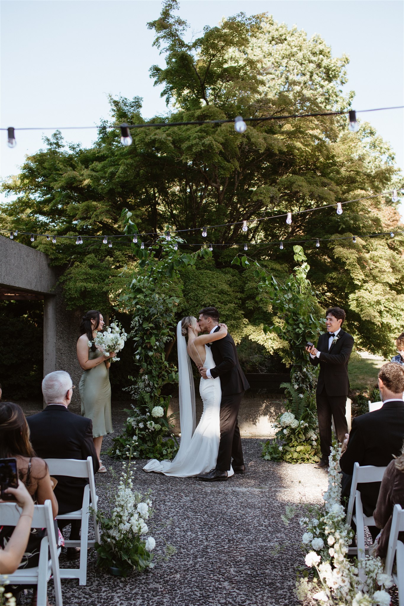 green black and white wedding colour palette, minimalist wedding colours, modern colour scheme, chic timeless attire, outdoor wedding, greenery wedding arch