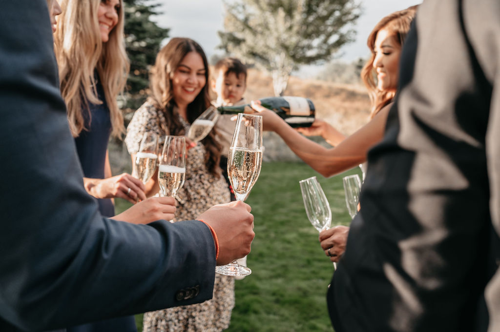 intimate elopement with family and friends, summer wedding inspiration, champagne toast