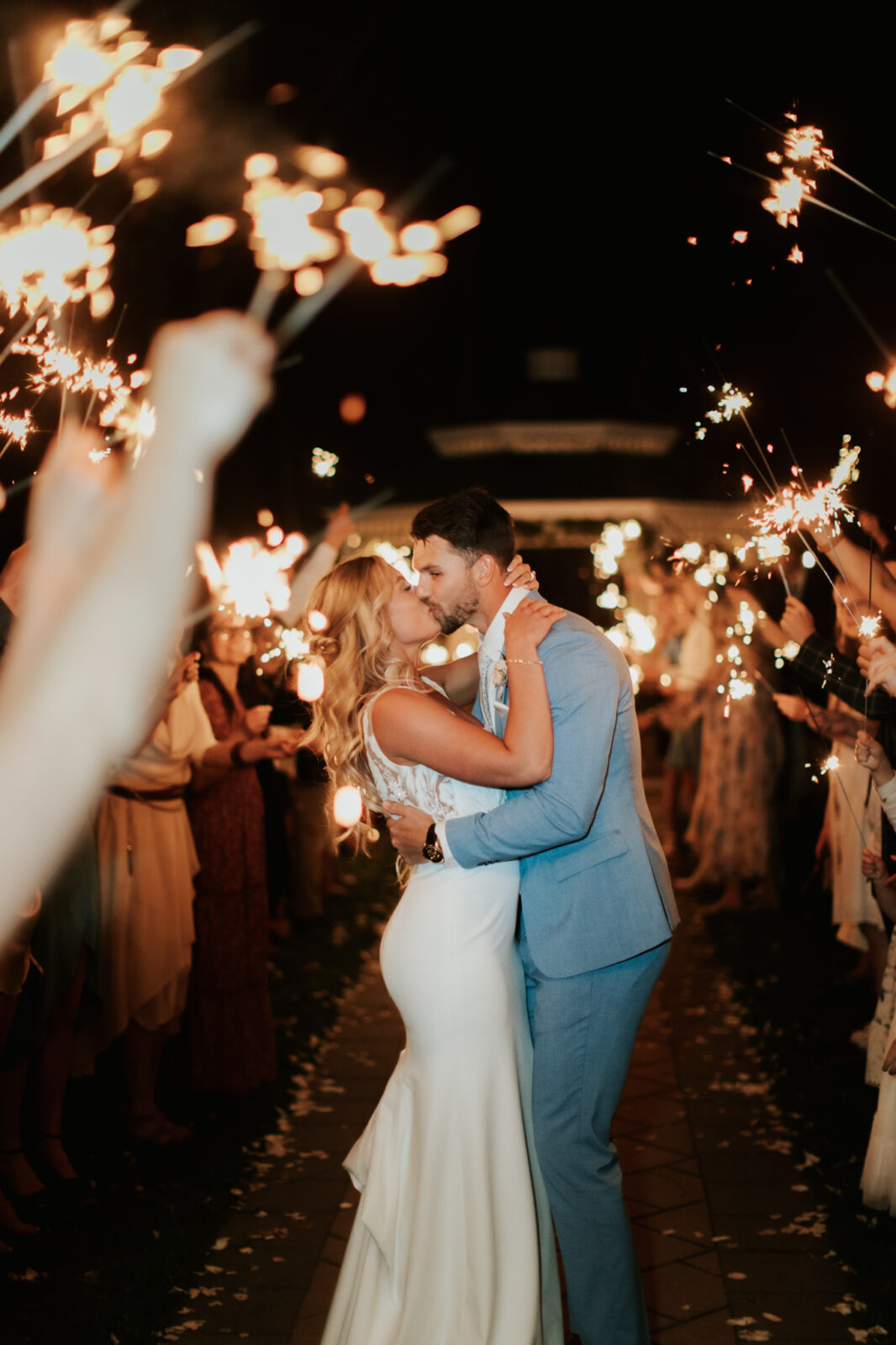 This Lethbridge wedding at Norland Historic Estate features a sparkler exit, vintage blue suits, and an old-school getaway. vintage getaway car, vintage meets classic wedding inspiration, summer wedding inspiration