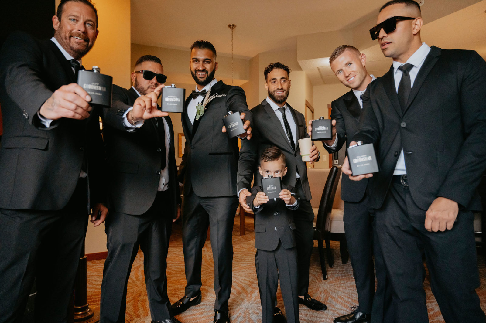 groomsmen with custom wedding flasks, groomsmen portraits 