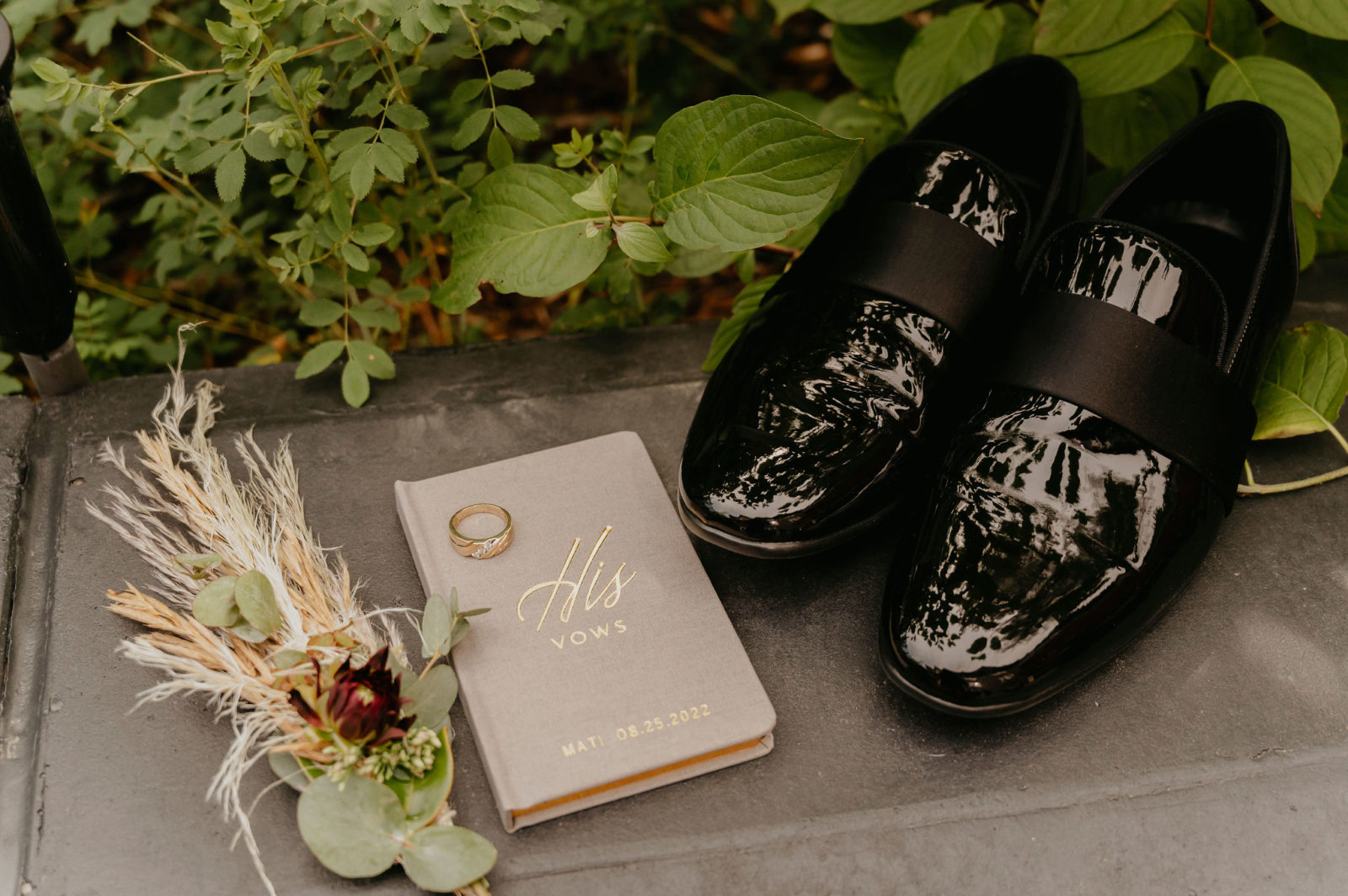 groom accessories with vow book
