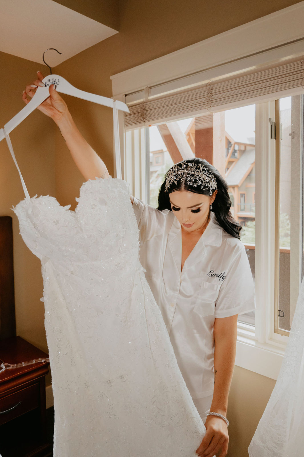 bride gets ready for wedding day, bride removes gown from bag