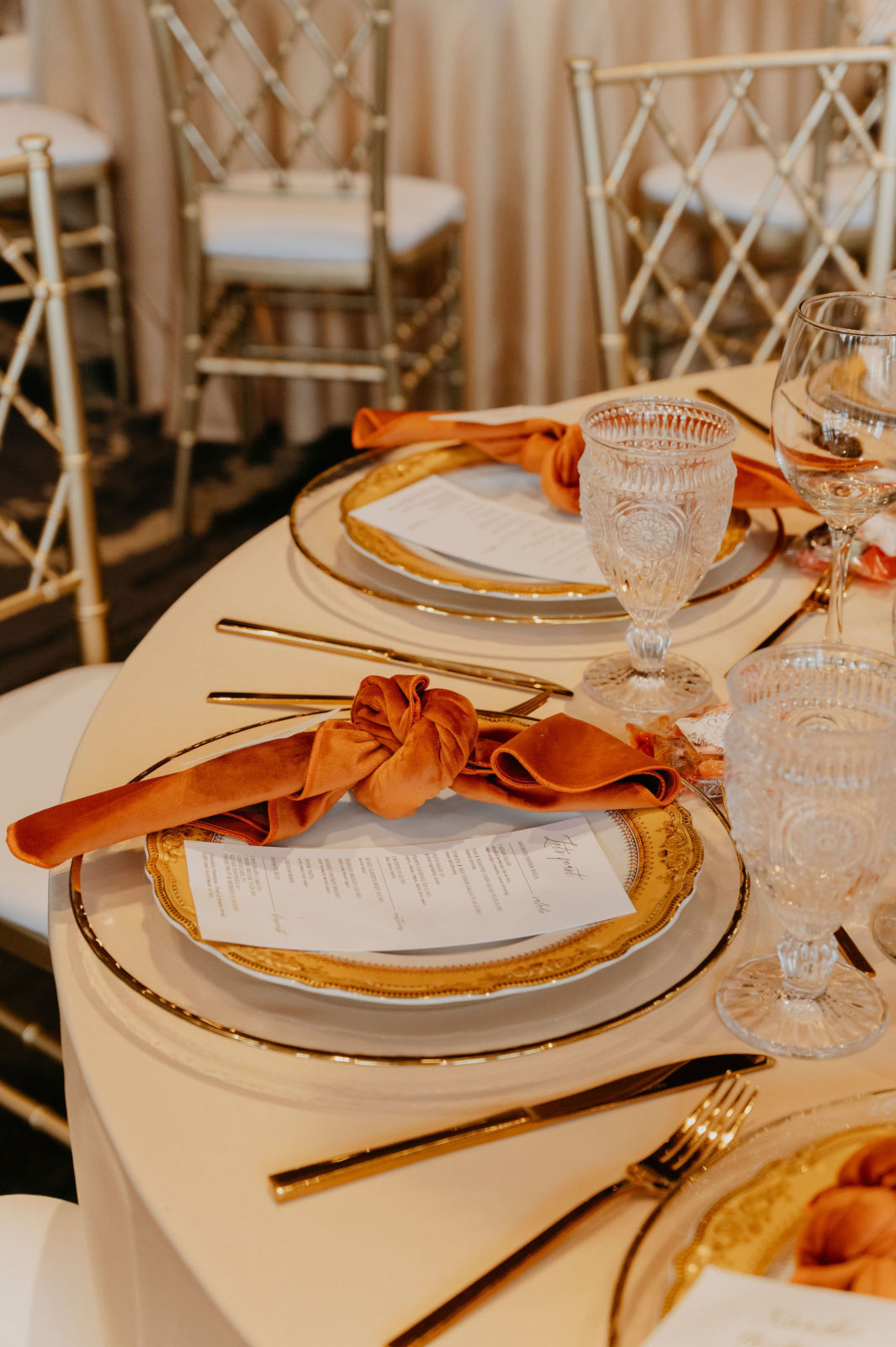 rust and gold boho table setting, wedding reception inspiration 